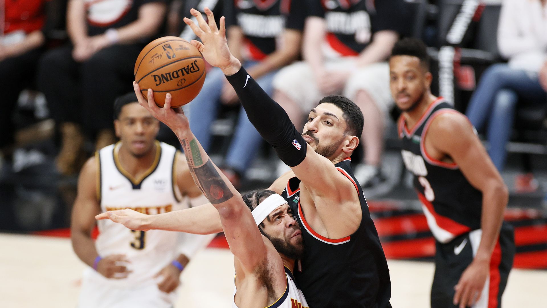 JaVale McGee #34 of the Denver Nuggets is defended by Enes Kanter #11 of the Portland Trail Blazers in the fourth quarter during Round 1, Game 4 of the 2021 NBA Playoffs at Moda Center on May 29