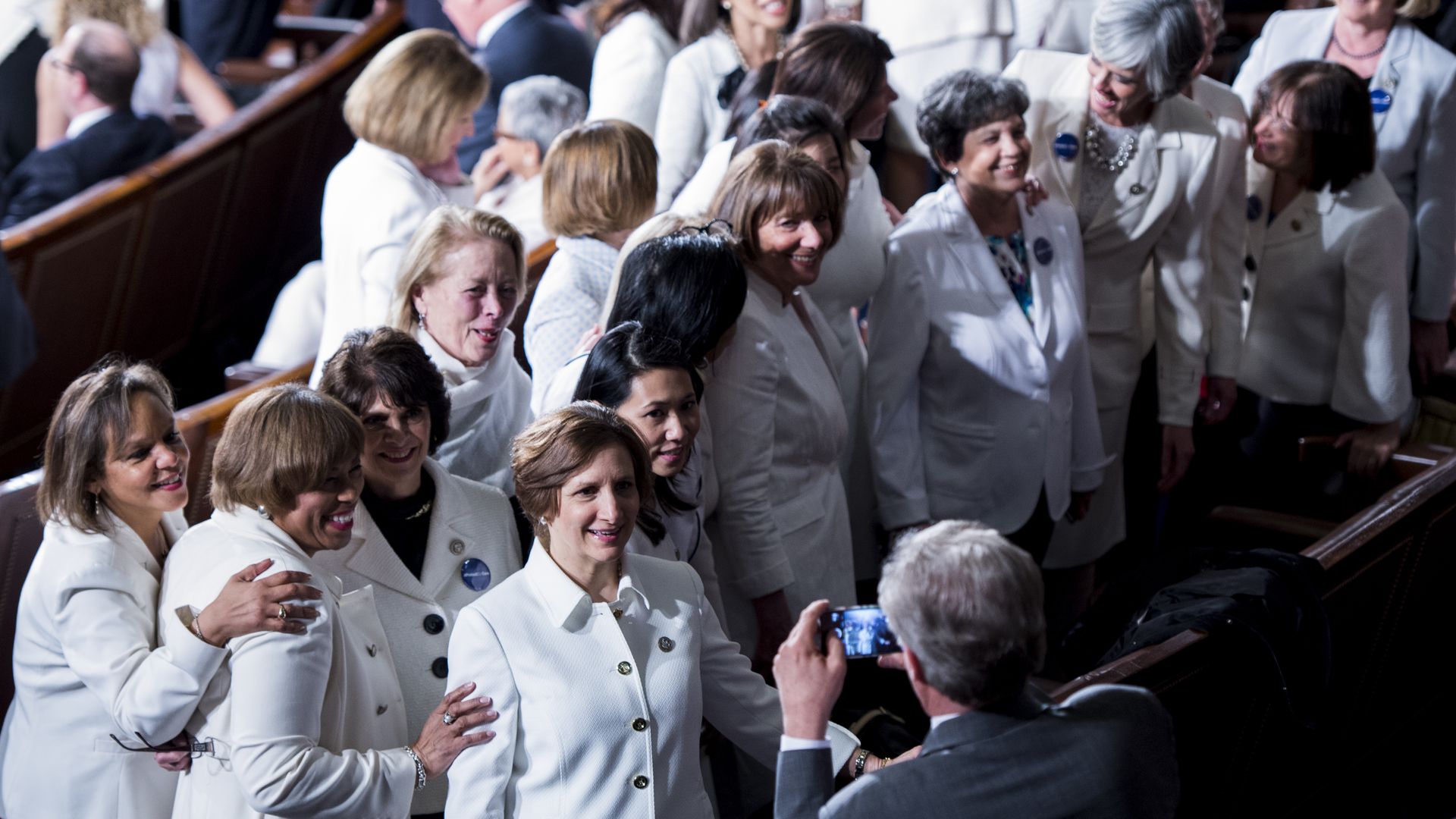 Group of Democratic women get their photo taken at President Trump's address to Congress.