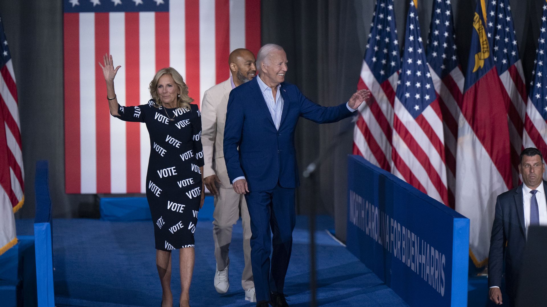 irst Lady Jill Biden, with "VOTE" printed on her dress, and U.S. President Joe Biden arrive at a post-debate campaign rally on June 28, 2024 in Raleigh, North Carolina. 