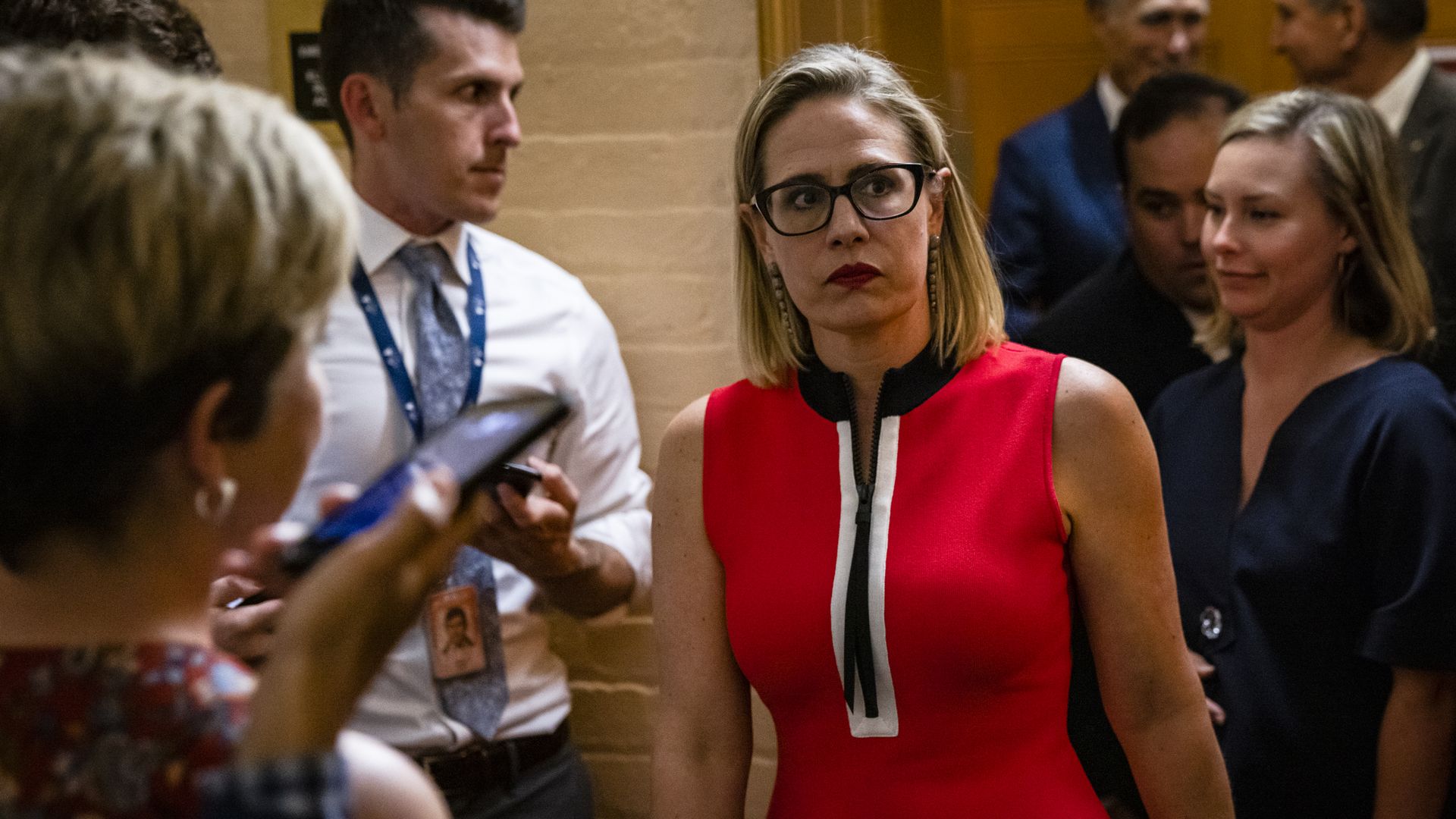 Sen. Kirsten Sinema (D-AZ) heads back to a bipartisan meeting on infrastructure in the basement of the U.S. Capitol building
