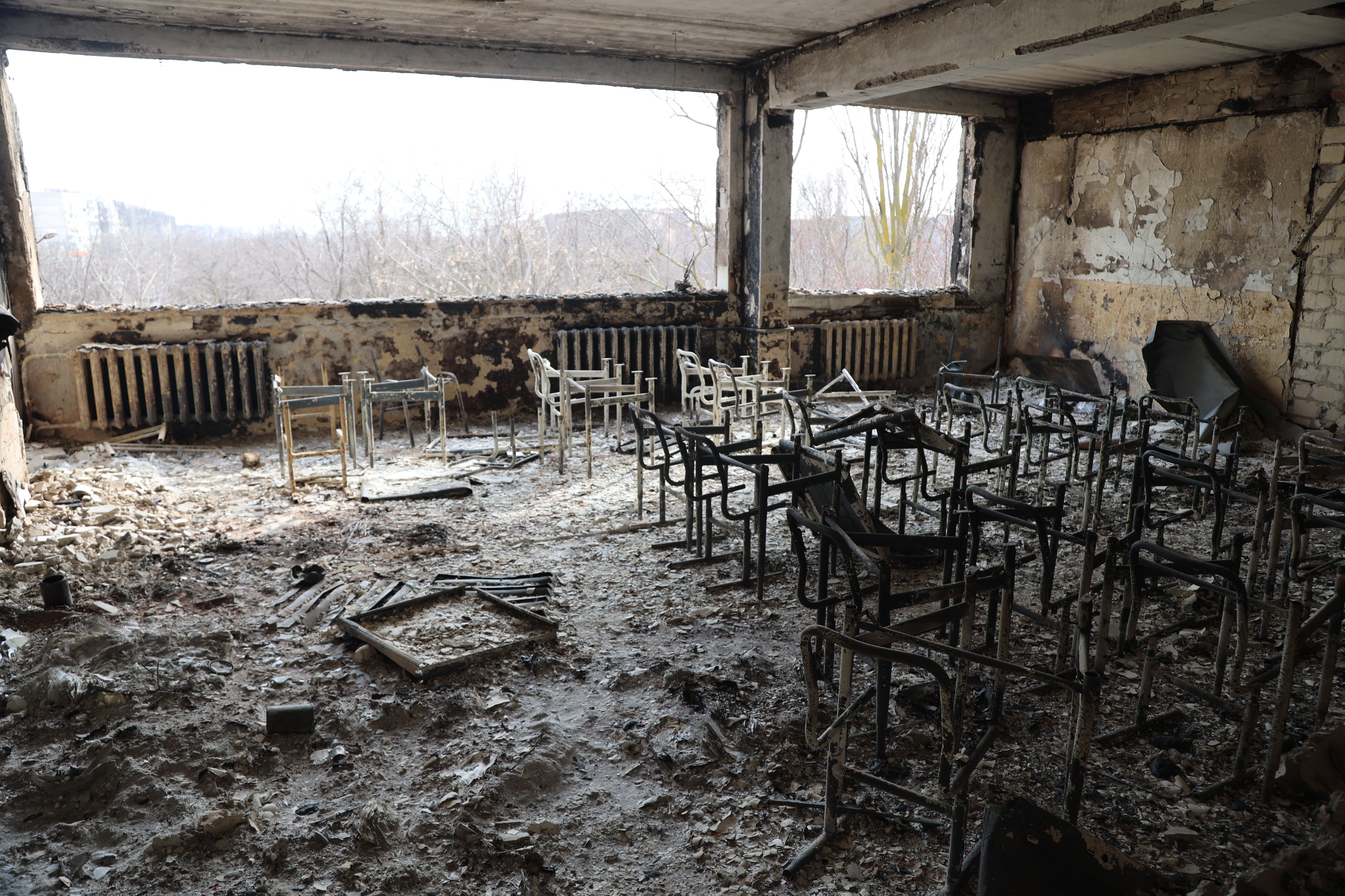     View of a school damaged after a shelling on March 29 in the Ukrainian city of Mariupol, controlled by the Russian military and pro-Russian separatists.