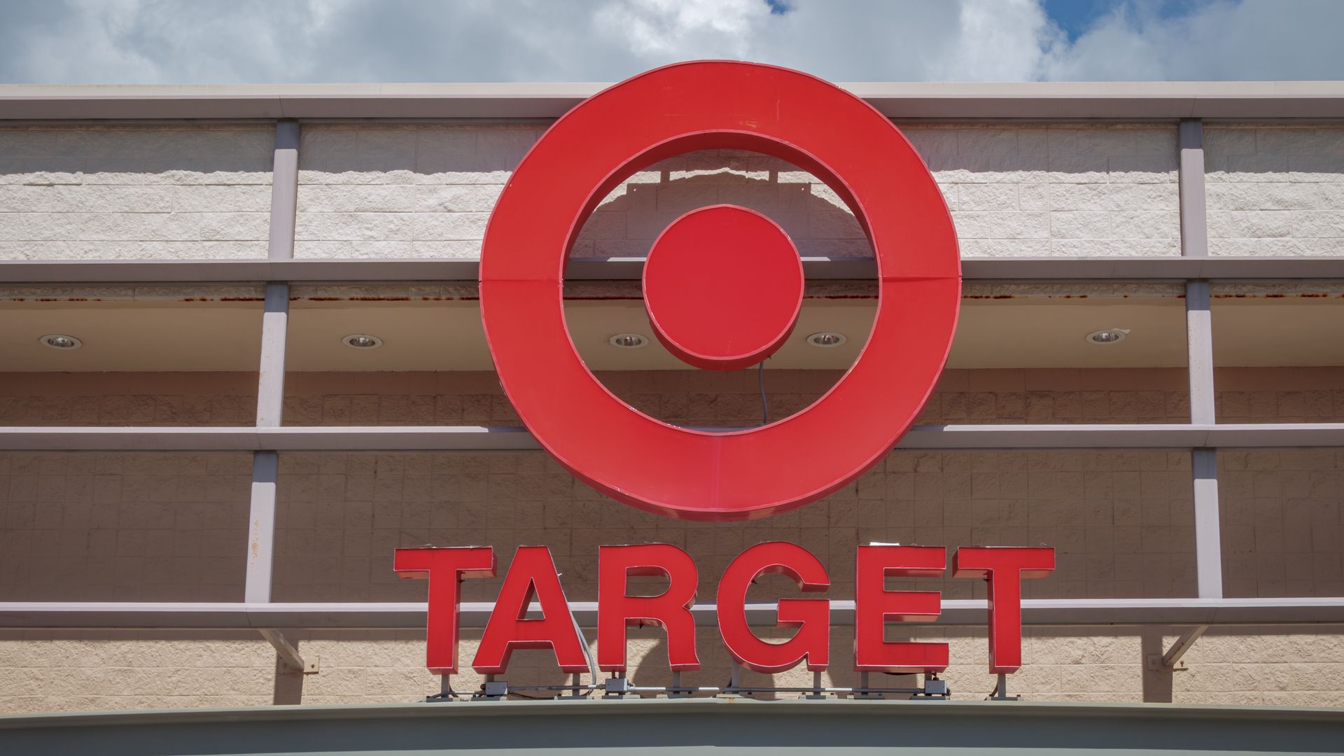 Target storefront sign with retailer's bullseye logo