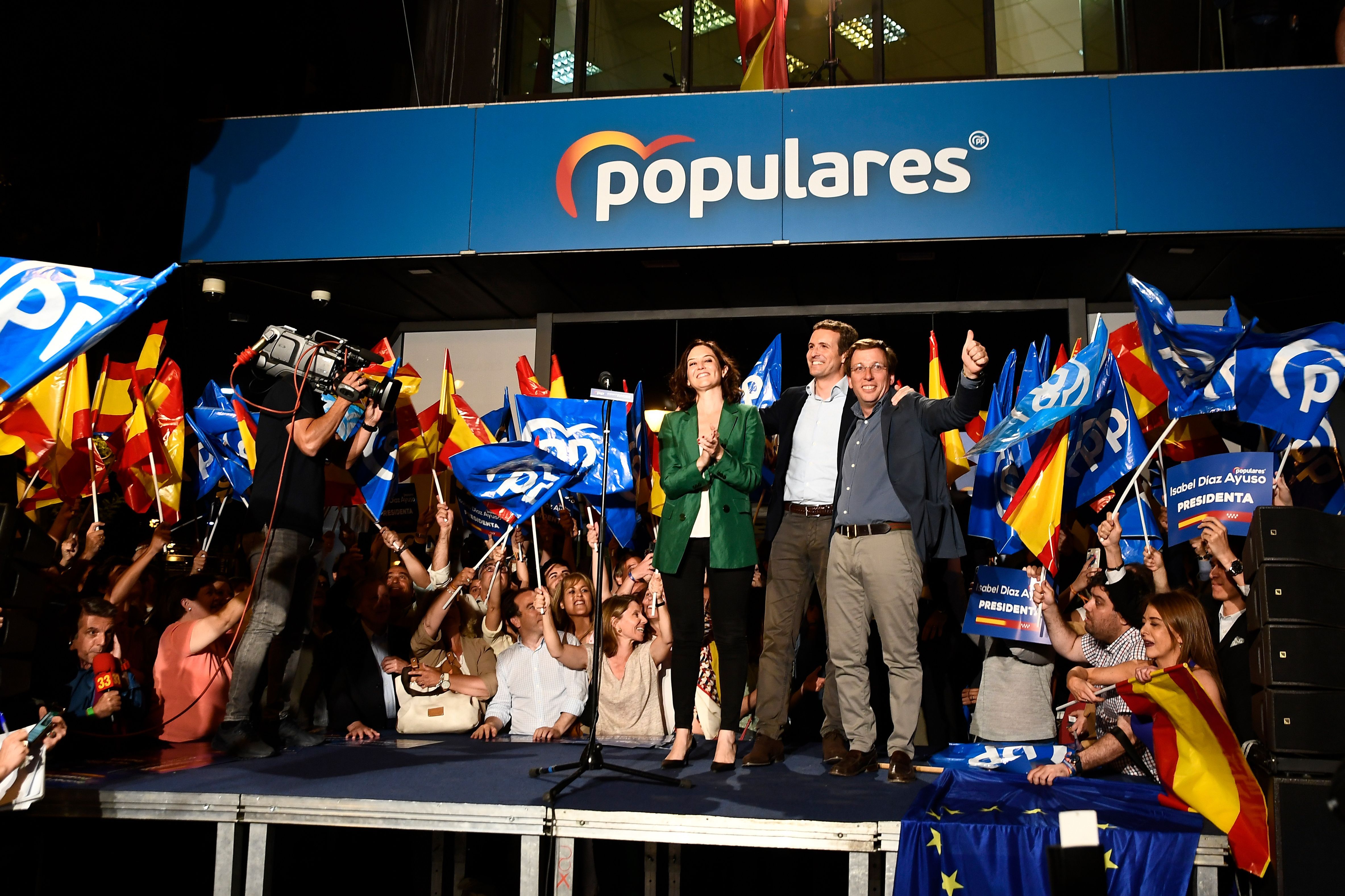 Leader of Spanish People's Party (PP), conservative Pablo Casado (C), celebrates the election results.