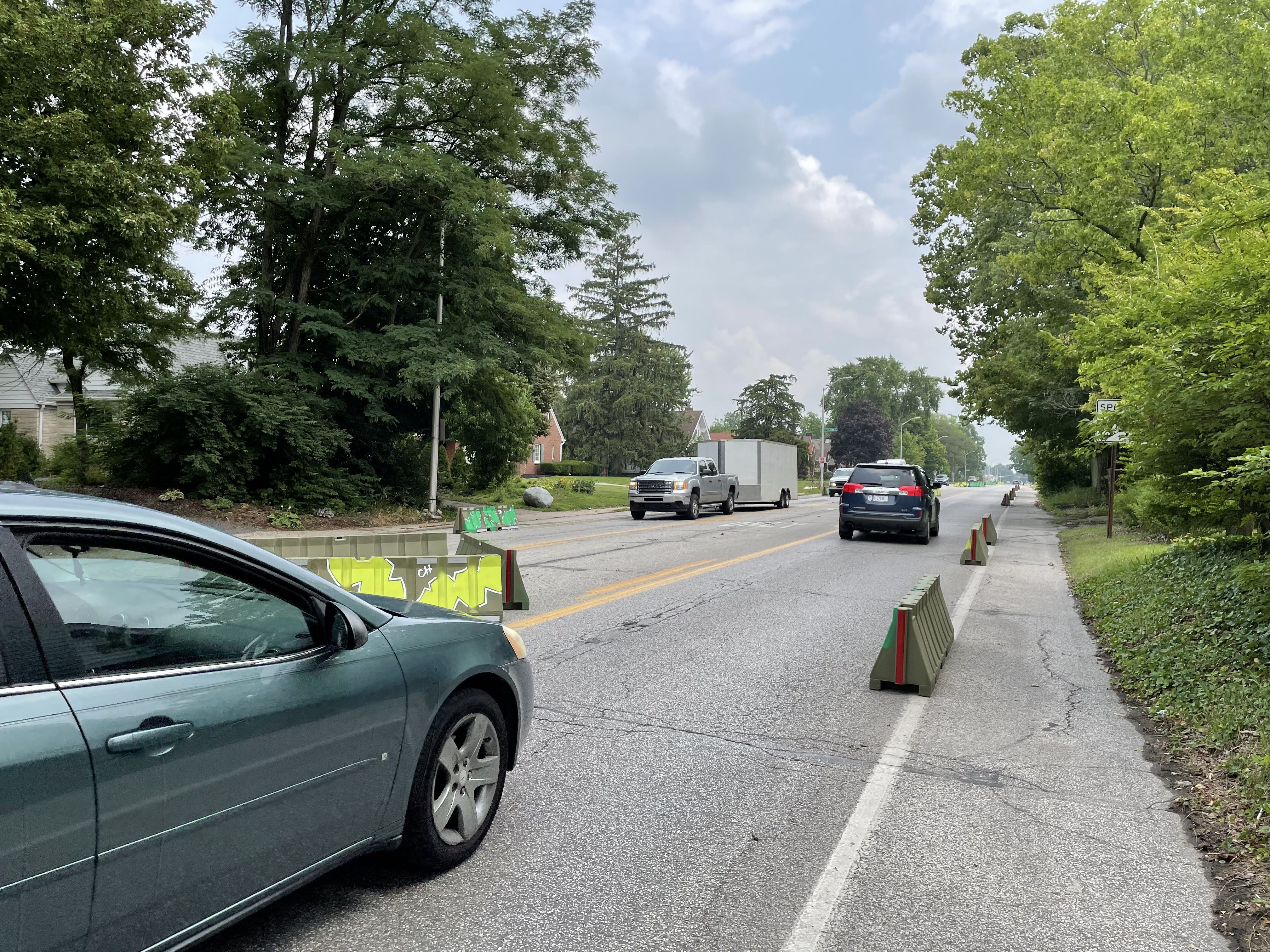 Drivers navigate barriers on East 10th Street in Indianapolis.