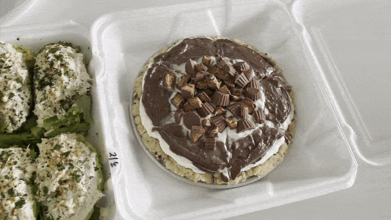 Image shows several boxes of food.