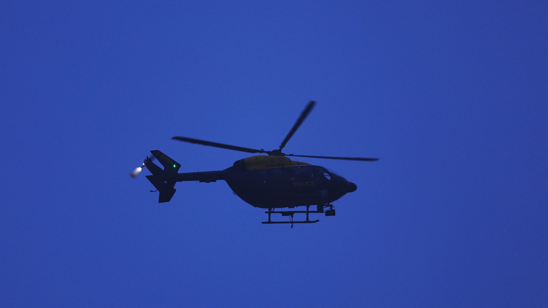 helicopter against night sky