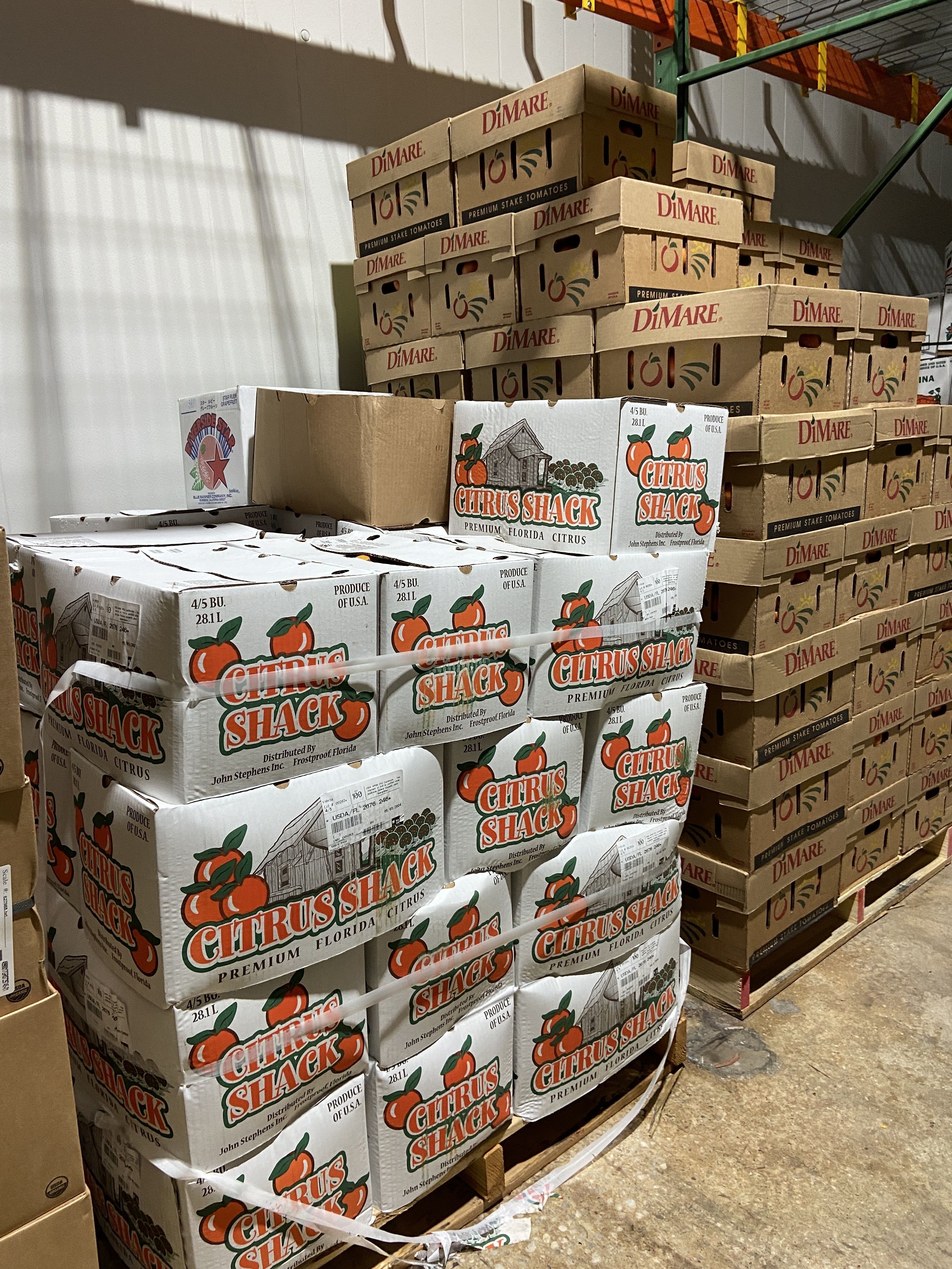 Produce in a walk-in cooler.