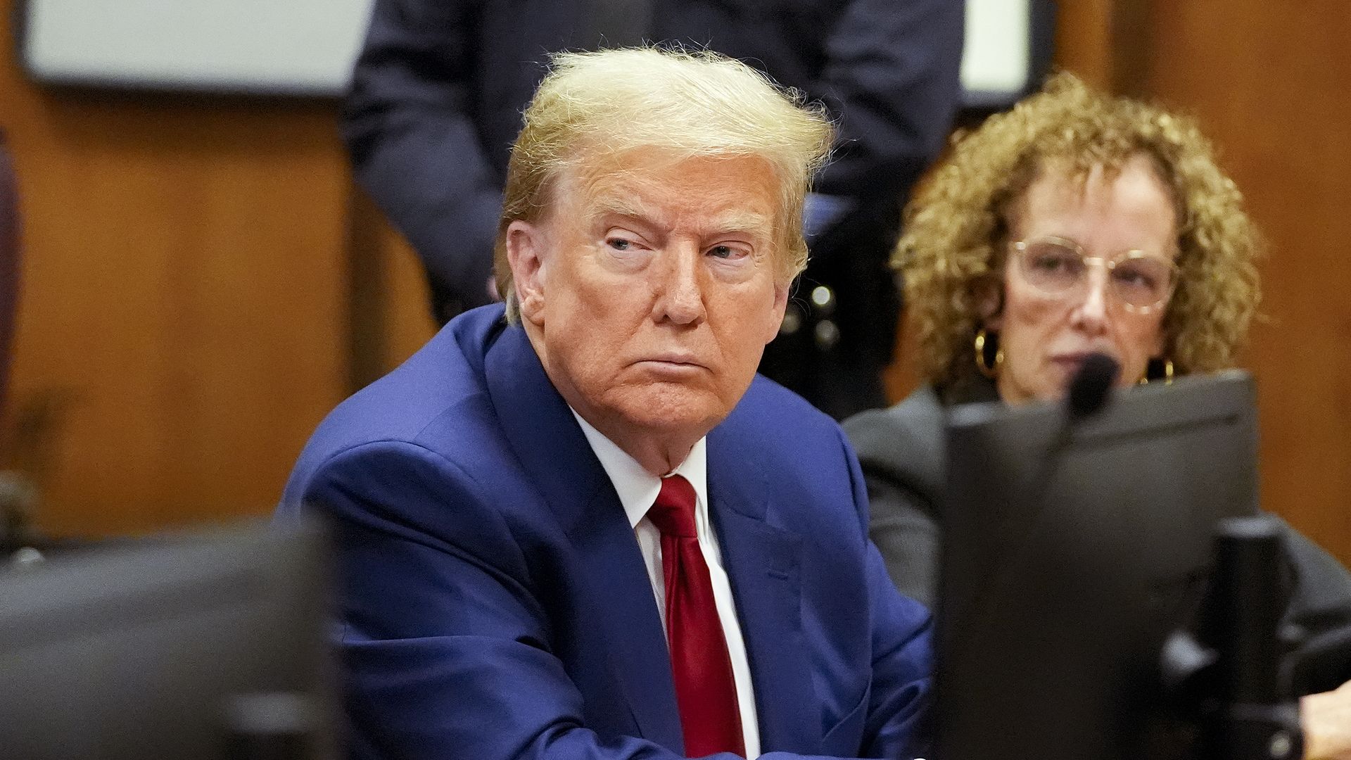  Former U.S. President Donald Trump appears with his lawyer Susan Necheles for a pre-trial hearing in a hash money case in criminal court on March 25, 2024 in New York City