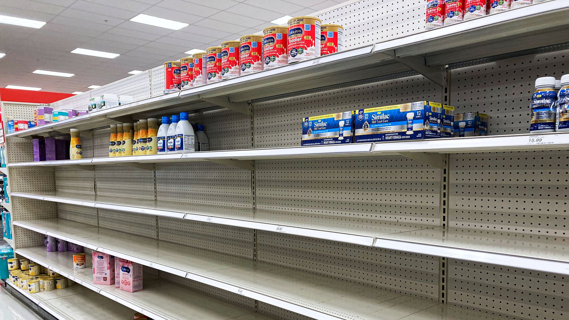 Empty shelves for baby formula.