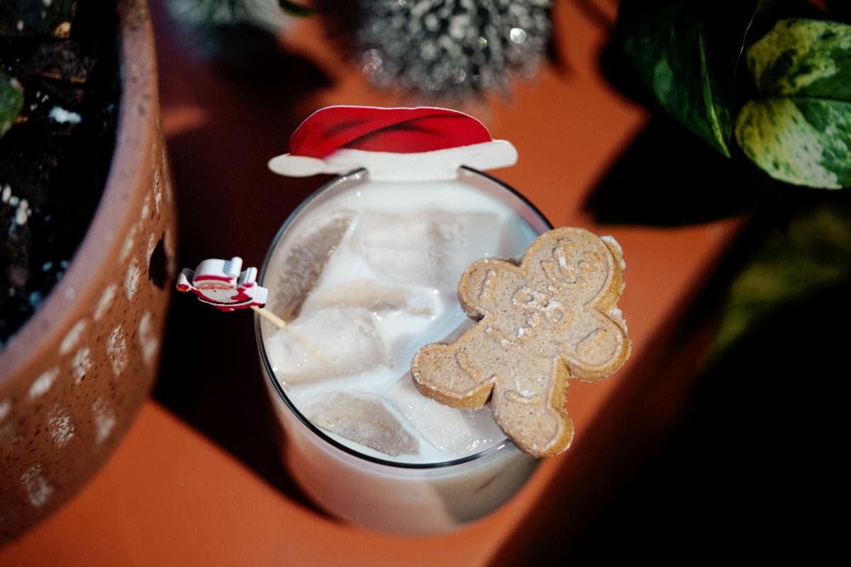 A Christmas cocktail with a gingerbread garnish at Lulu's. 