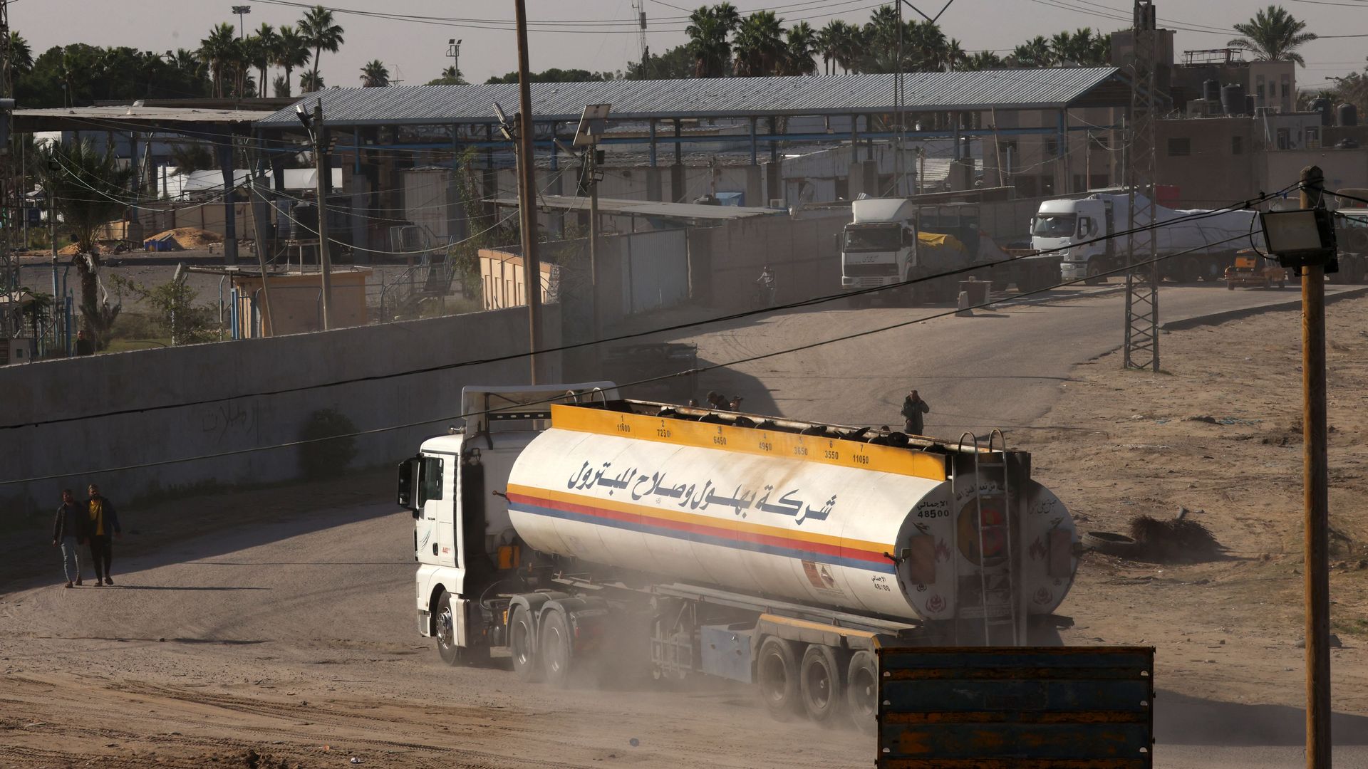 A fuel truck enters the Gaza Strip via the Rafah crossing with Egypt, hours after the start of a four-day truce in battles between Israel and Palestinian Hamas militants, on November 24, 2023.