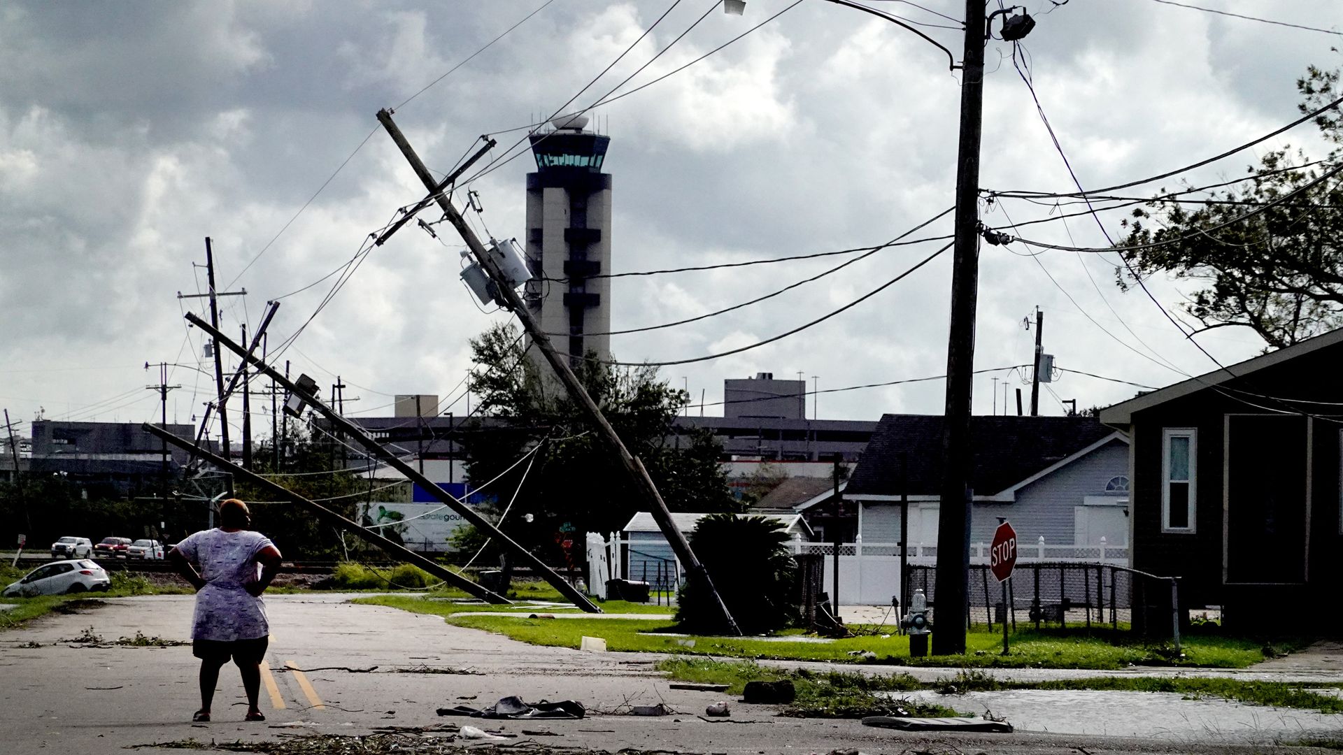 A person looking over damage caused by Hurricane Ida in Kenner, Louisiana, on Aug. 30.