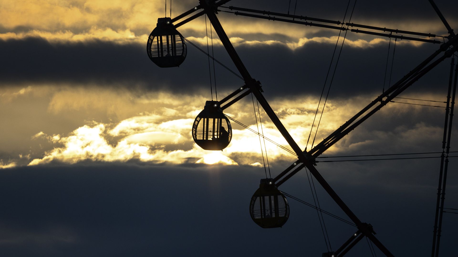 A ferris wheel at sunset