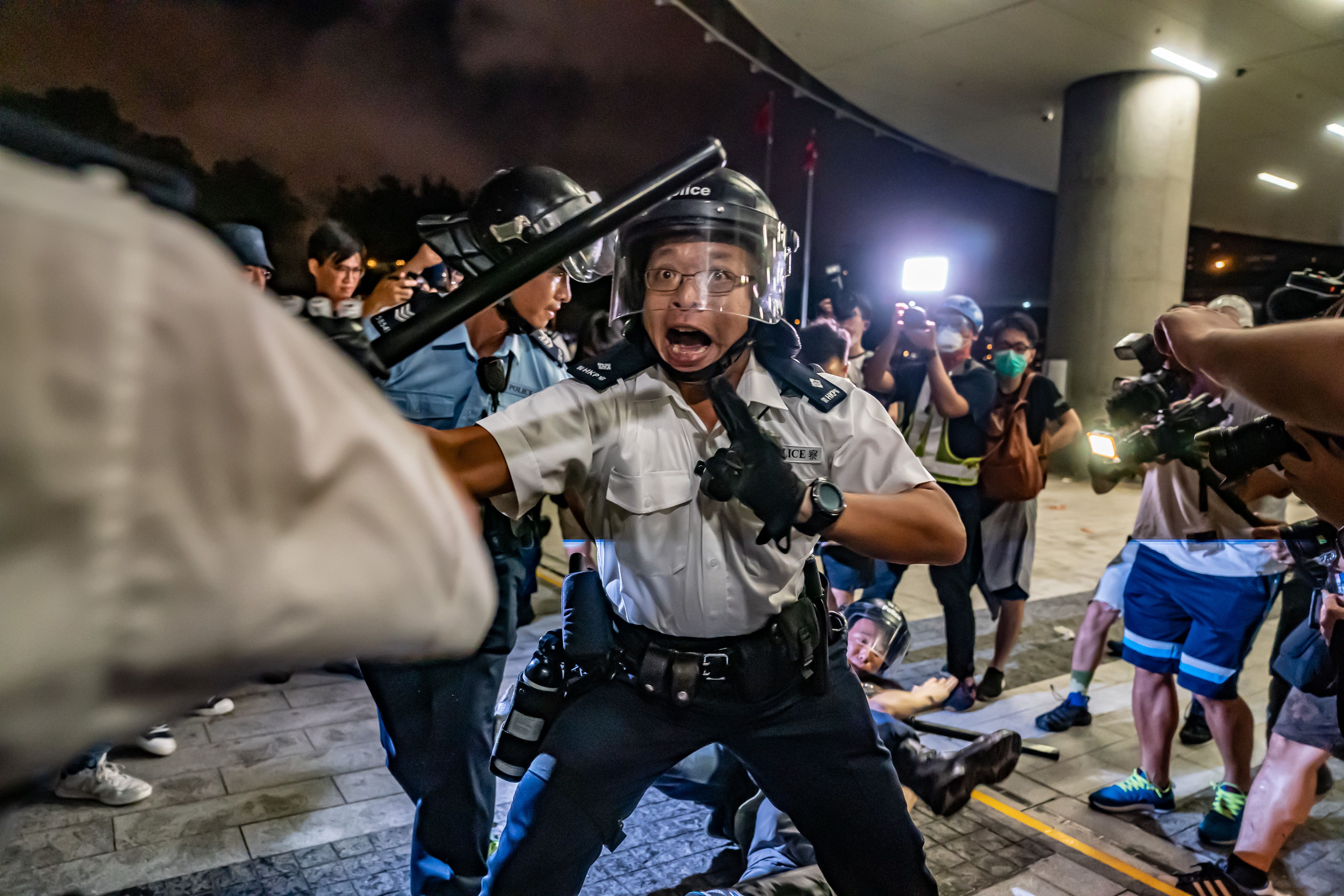 Hong Kong officer yelling