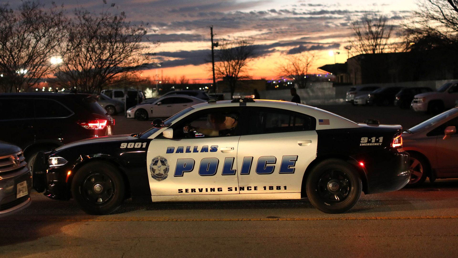 A Dallas Police Department vehicle patrols an area in Dallas, Texas, U.S., on Tuesday, Feb. 1, 2022.