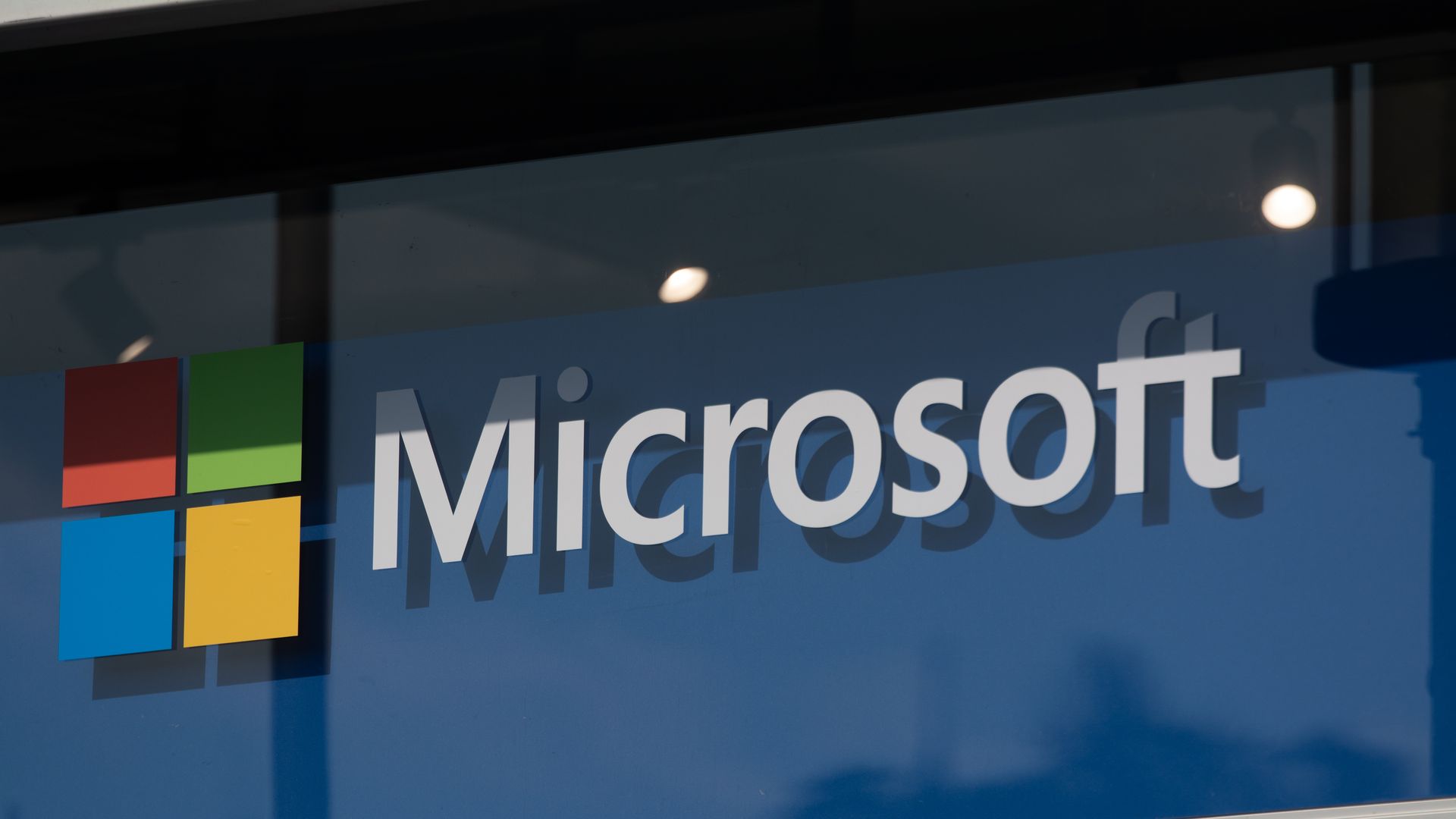 A Microsoft sign is seen at Media Park on the opening day of Deutsche Telekom's Digital X event in Cologne, Germany.