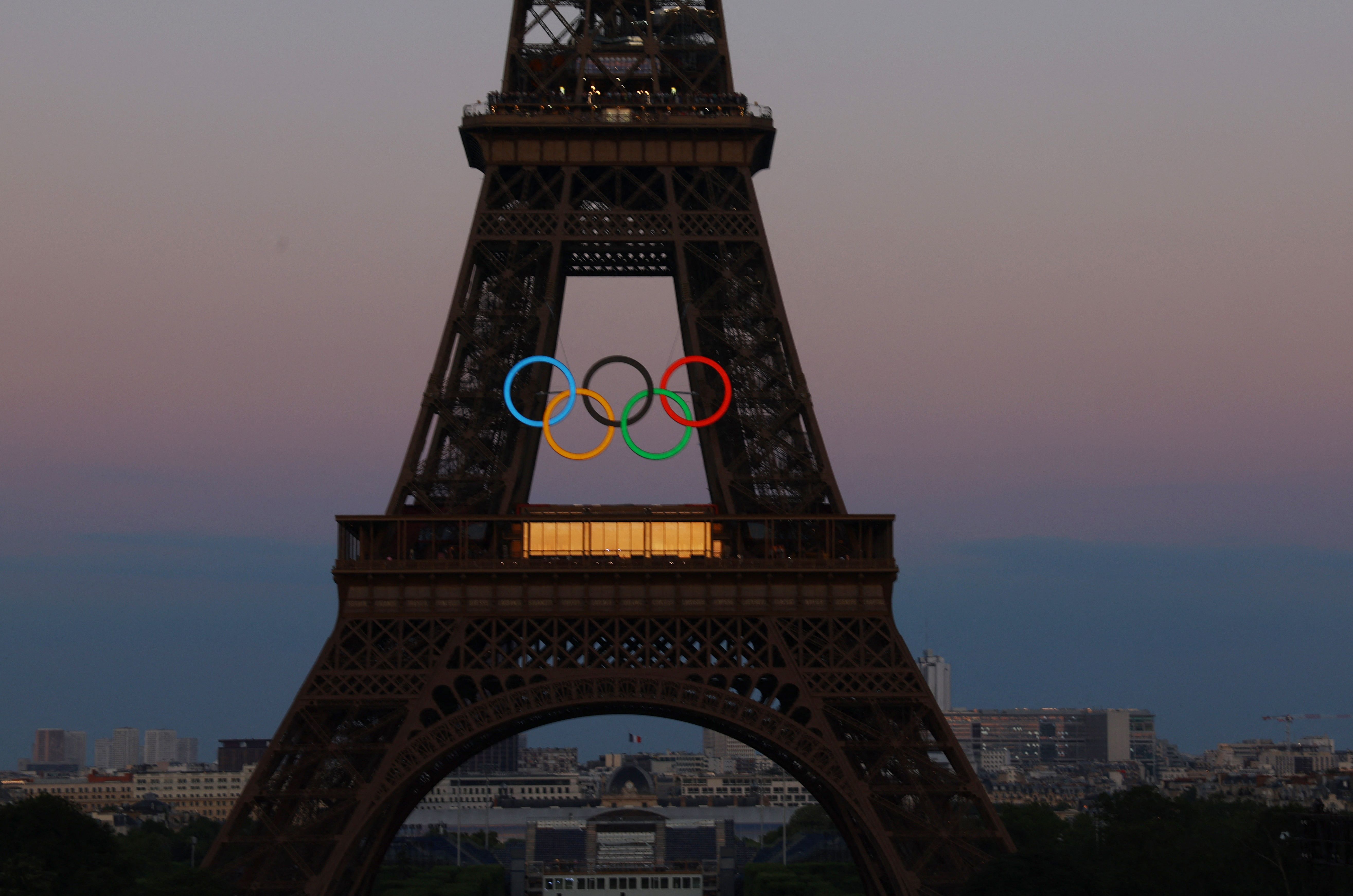 The Olympic rings on the Eiffel Tower.