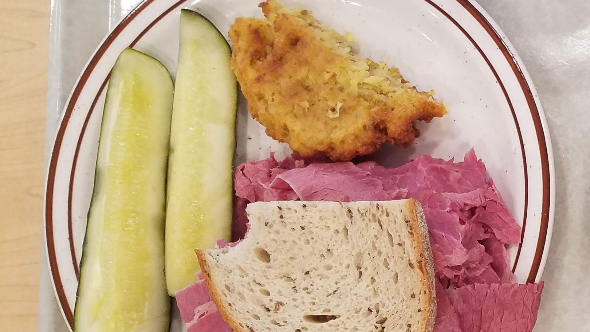 plate of corned beef and latke