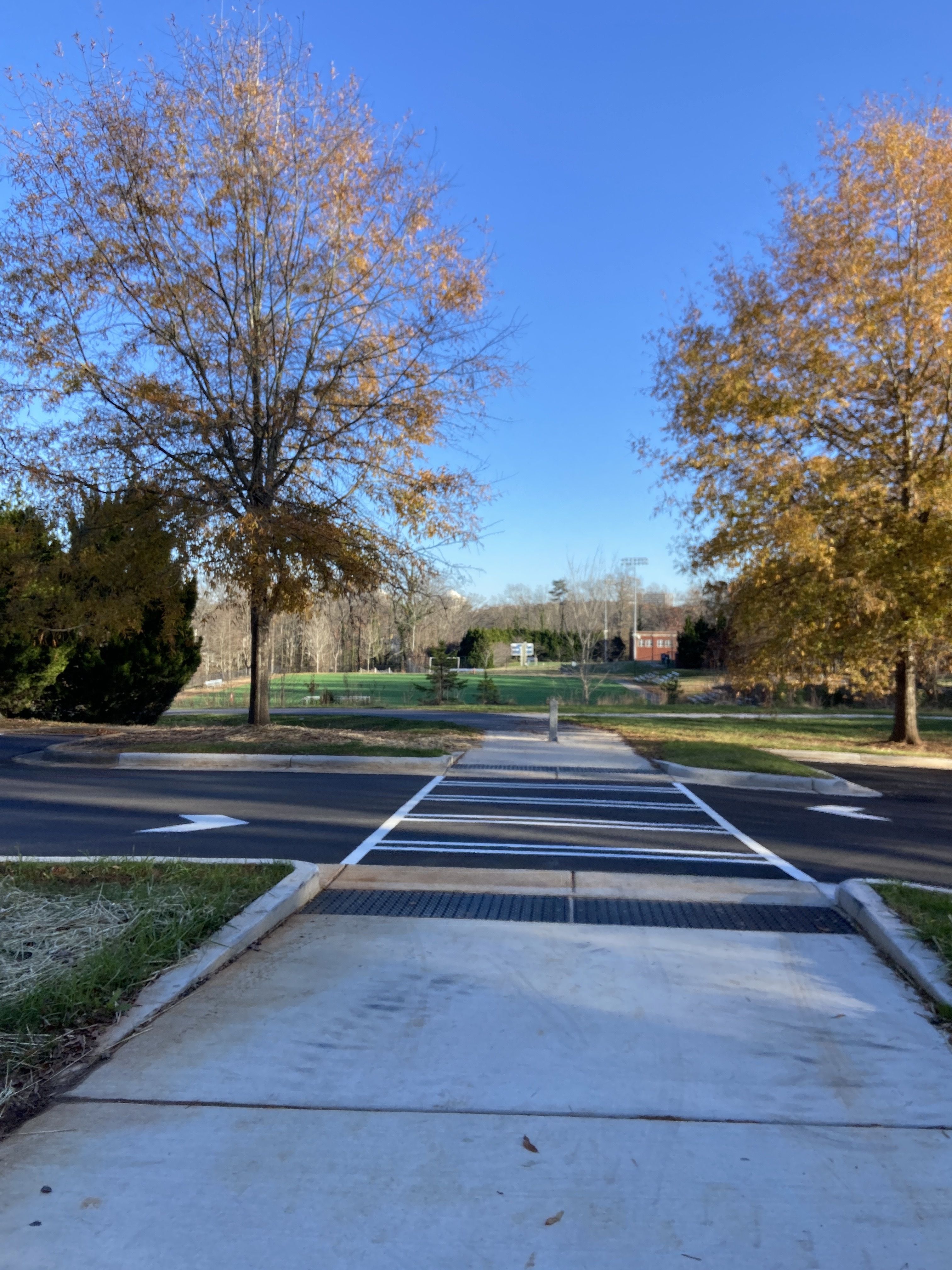 The path east will lead you toward Queens' athletic fields.