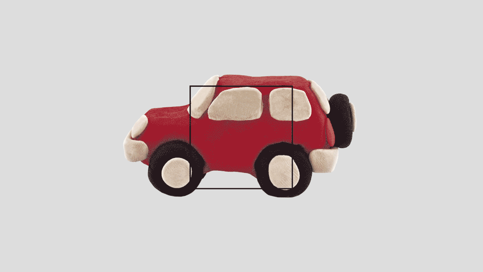 Animation of a clay car being squished into a box