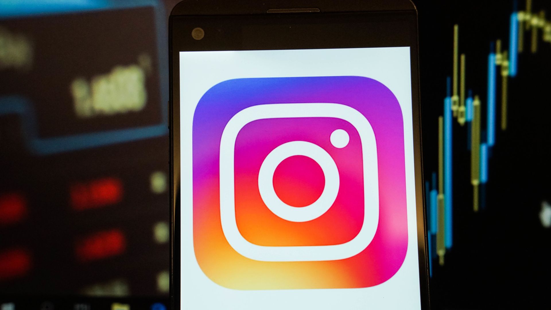 Instagram logo on the cell phone screen 