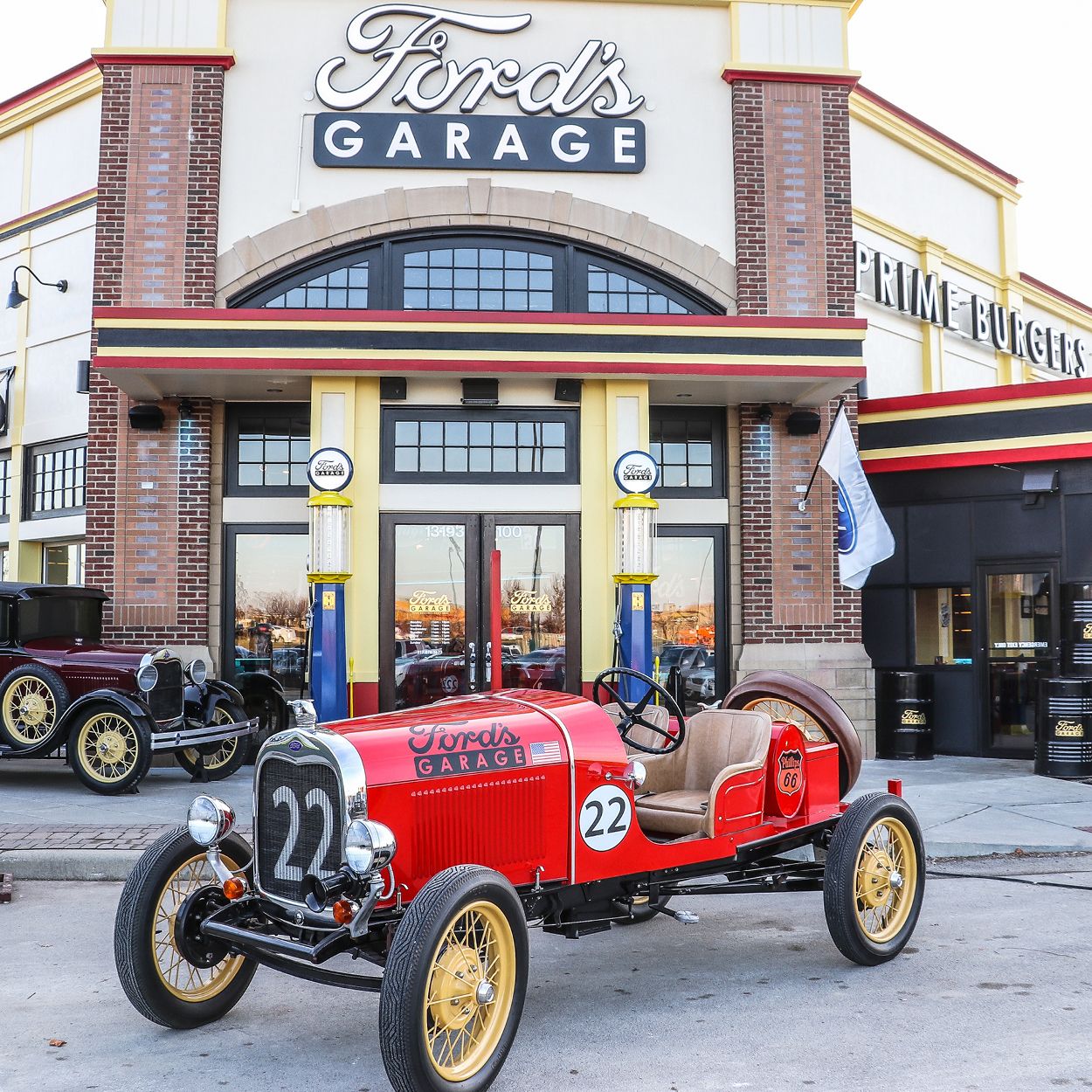 a classic car in front of a restaurant 
