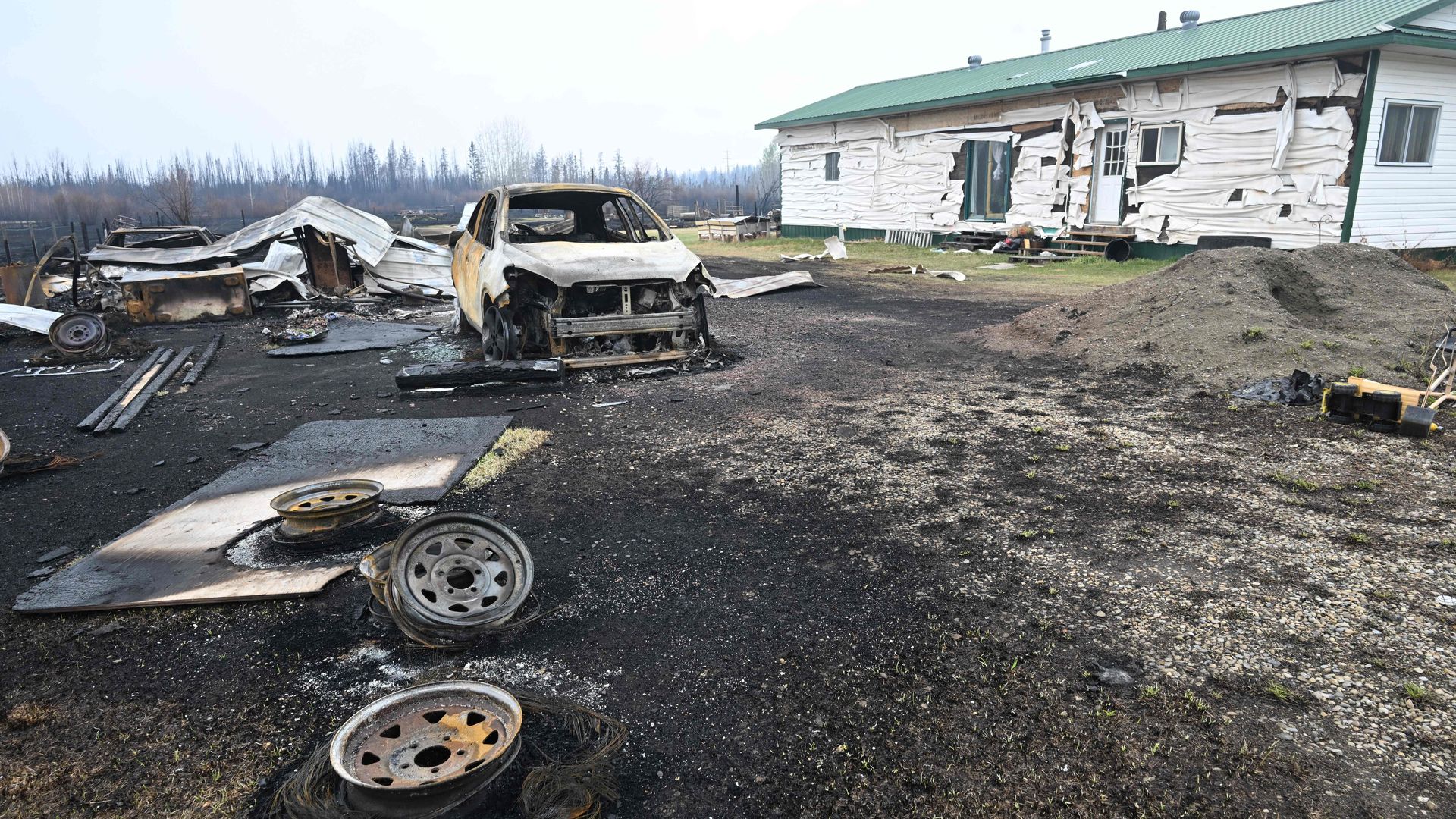 Damage is seen on the property of Adam Norris in Drayton Valley, Alberta, Canada, on May 8.