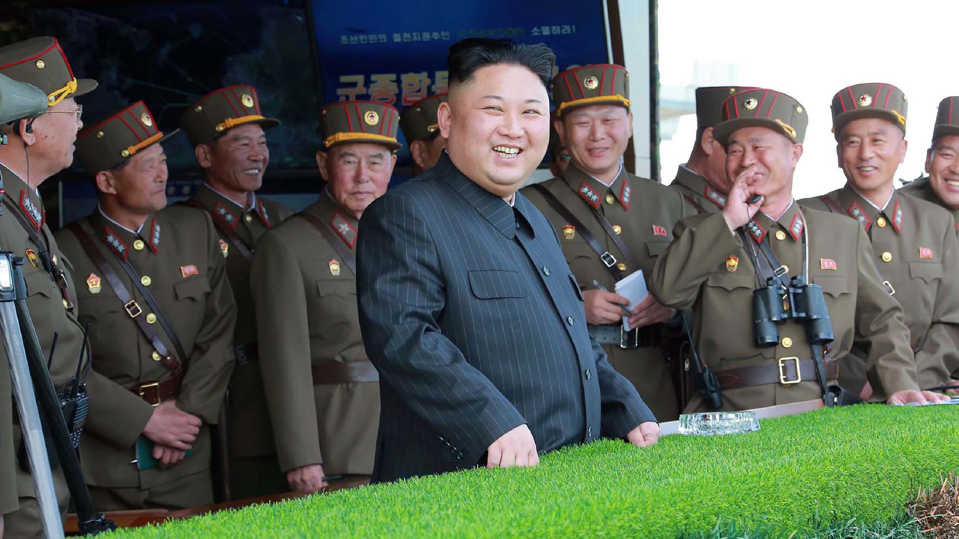 This undated picture released by North Korea's official Korean Central News Agency (KCNA) on April 26, 2017 shows North Korean leader Kim Jong-Un (C) attending the combined fire demonstration.