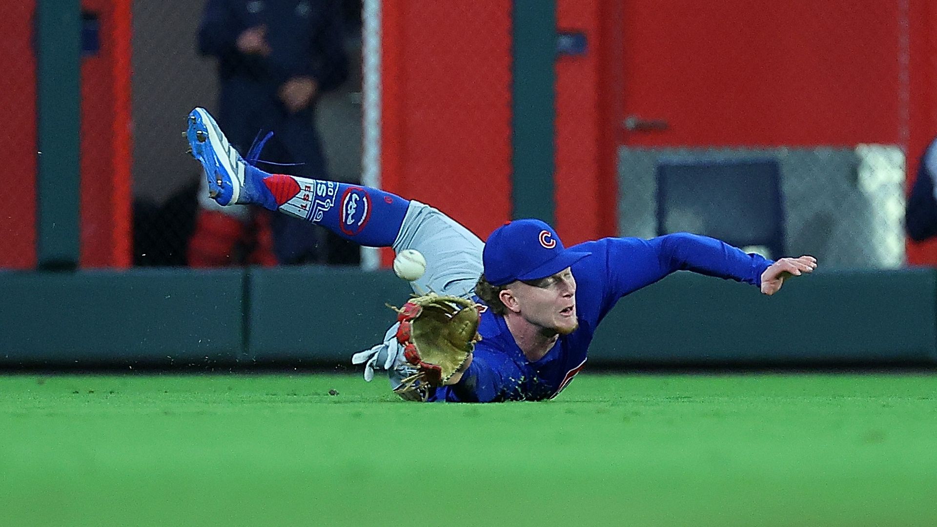 baseball player catching something 