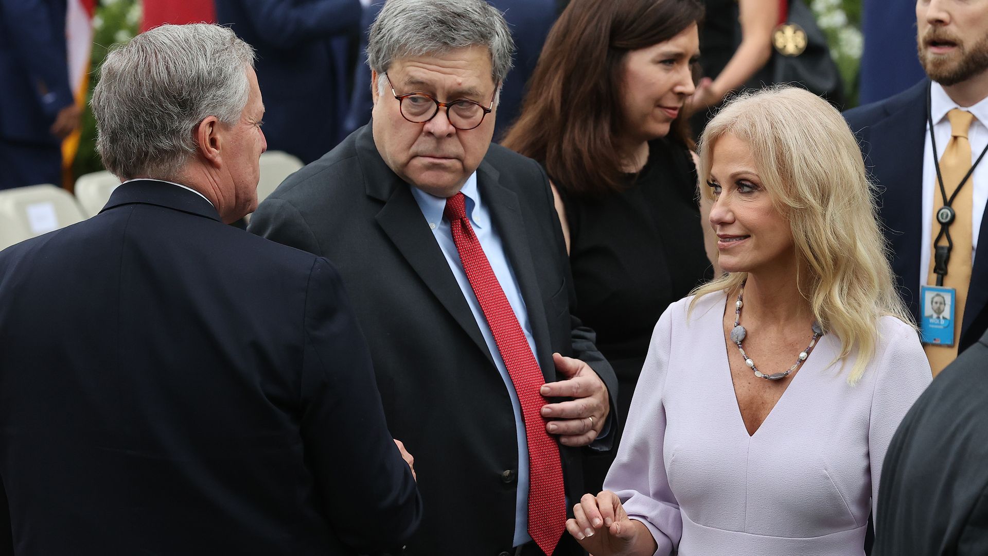 Kellyanne Conway with White House Chief of Staff Mark Meadows and Attorney General William Barr at the White House on Sept. 26.