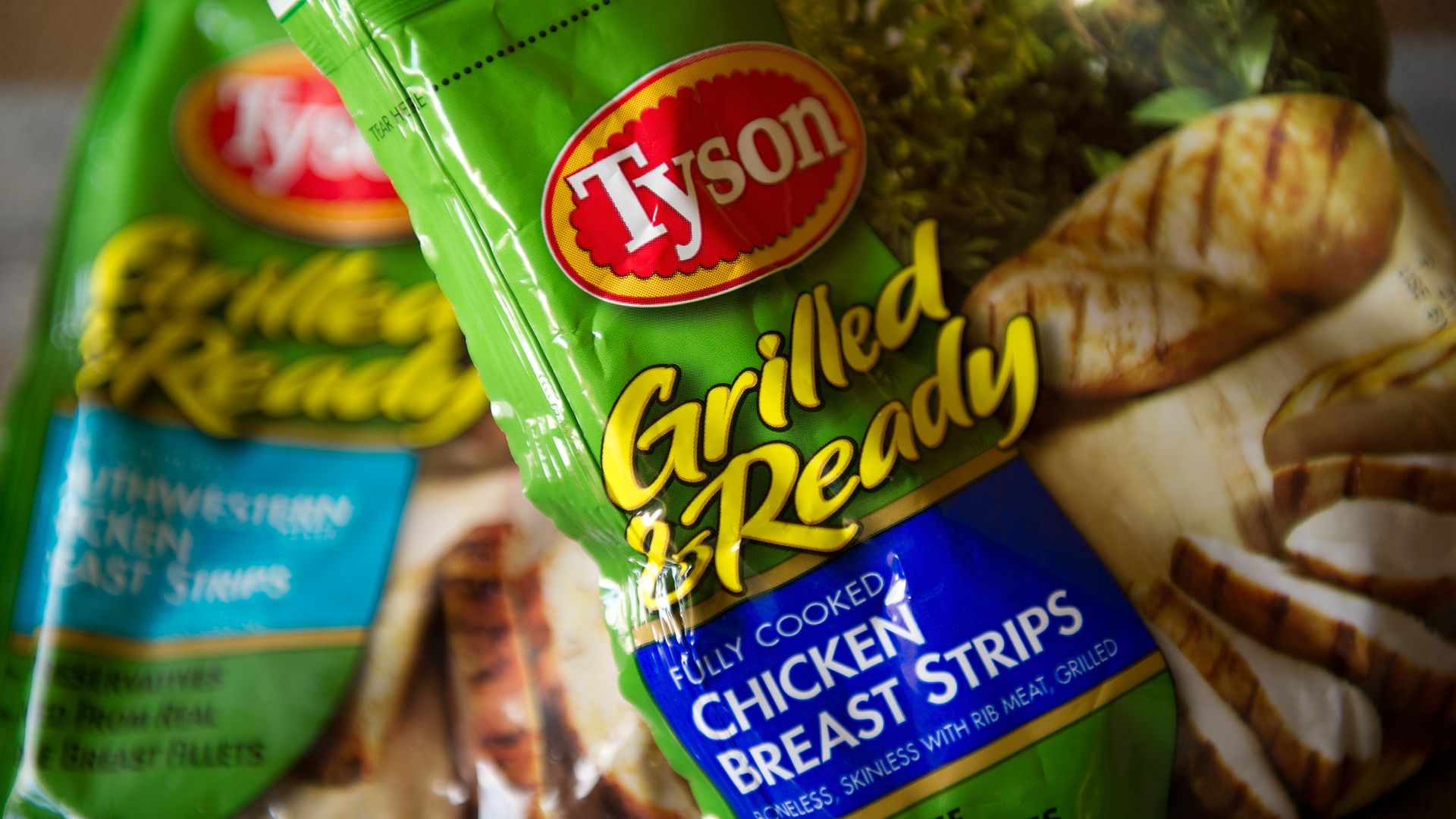 Packages of Tyson Foods Inc. chicken breast strips are arranged for a photograph in San Francisco, California, U.S., on Friday, July 29, 2011.