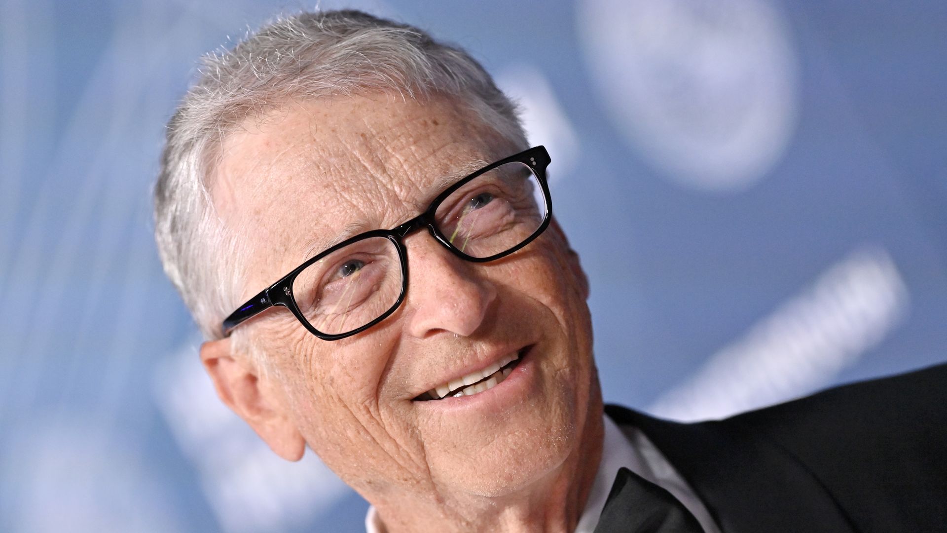 Bill Gates in a tux with glasses