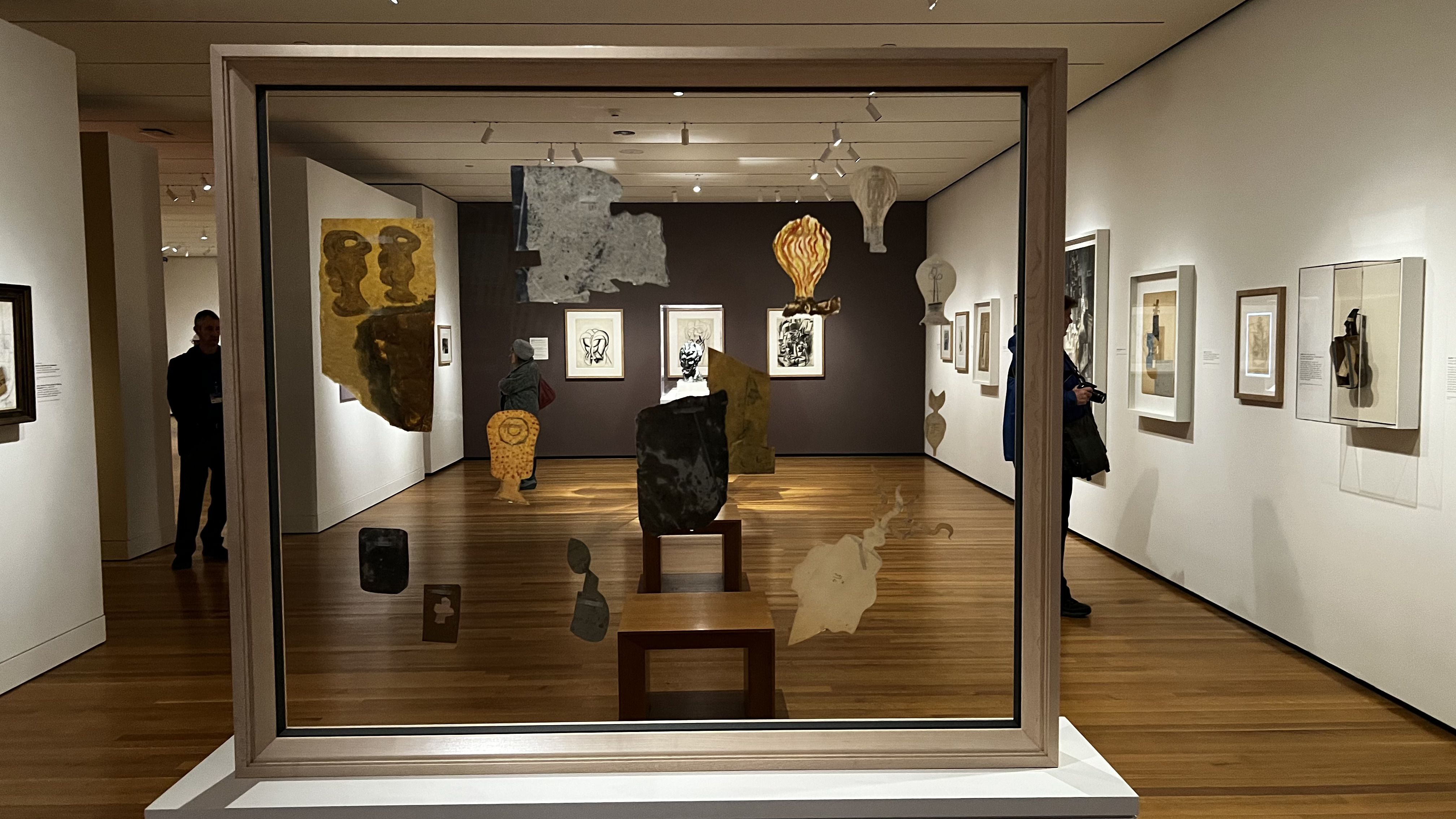 People visit Picasso and Paper exhibit.