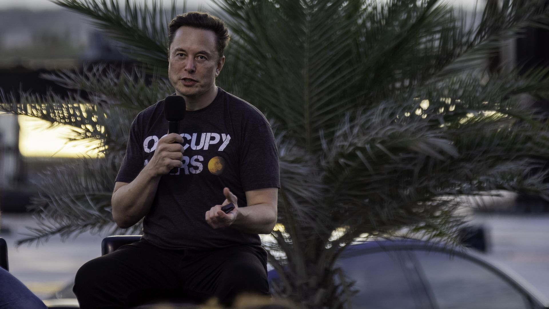 SpaceX founder Elon Musk speaks during a T-Mobile and SpaceX joint event on August 25, 2022 in Boca Chica Beach, Texas.