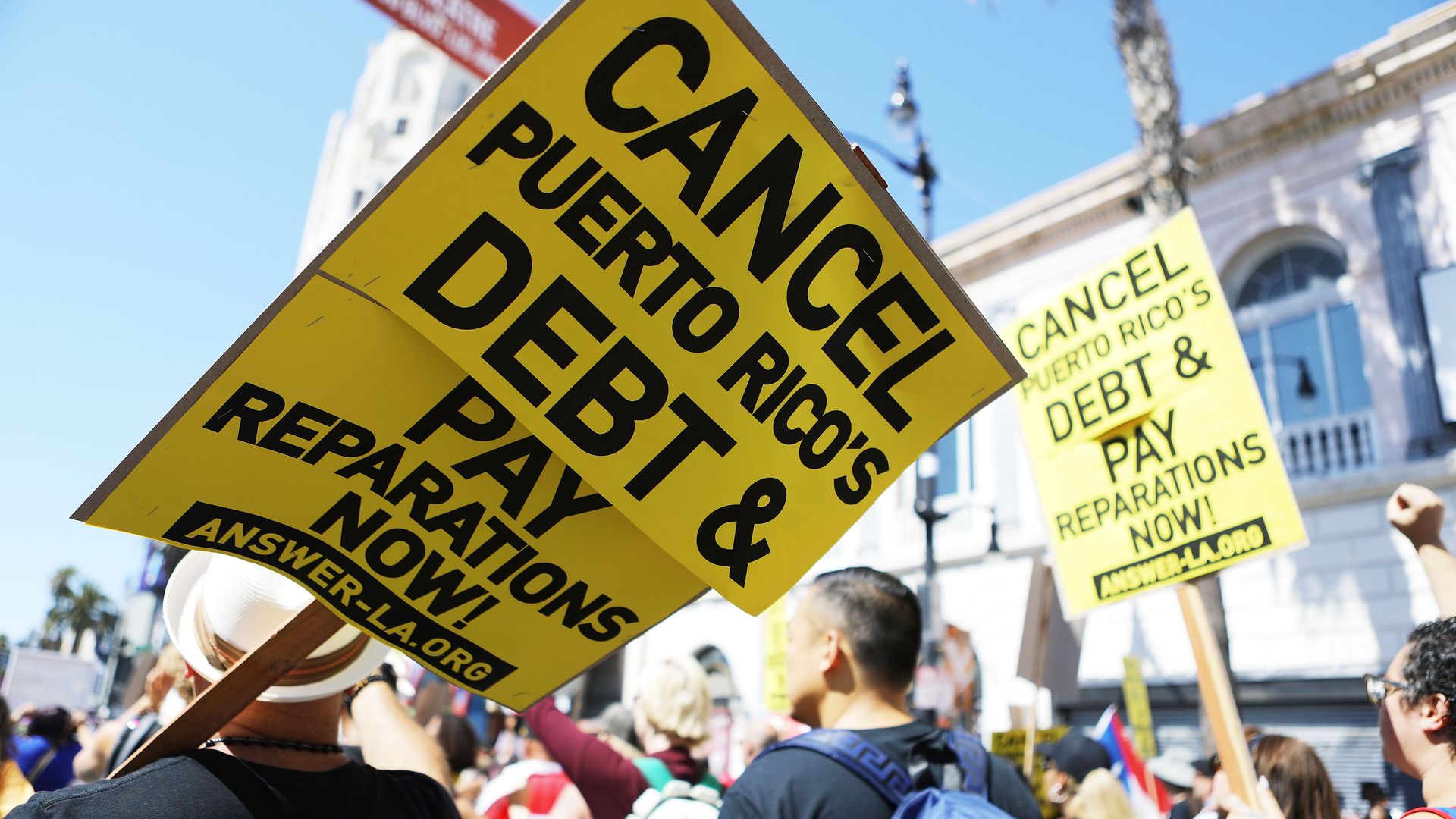 Activists march calling for support of Puerto Rico one year after Hurricane Maria devastated the island on September 23, 2018 in Los Angeles California.