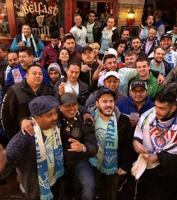MLS fans celebrate in Brevard Court hours after Charlotte was awarded the league's 30th expansion team