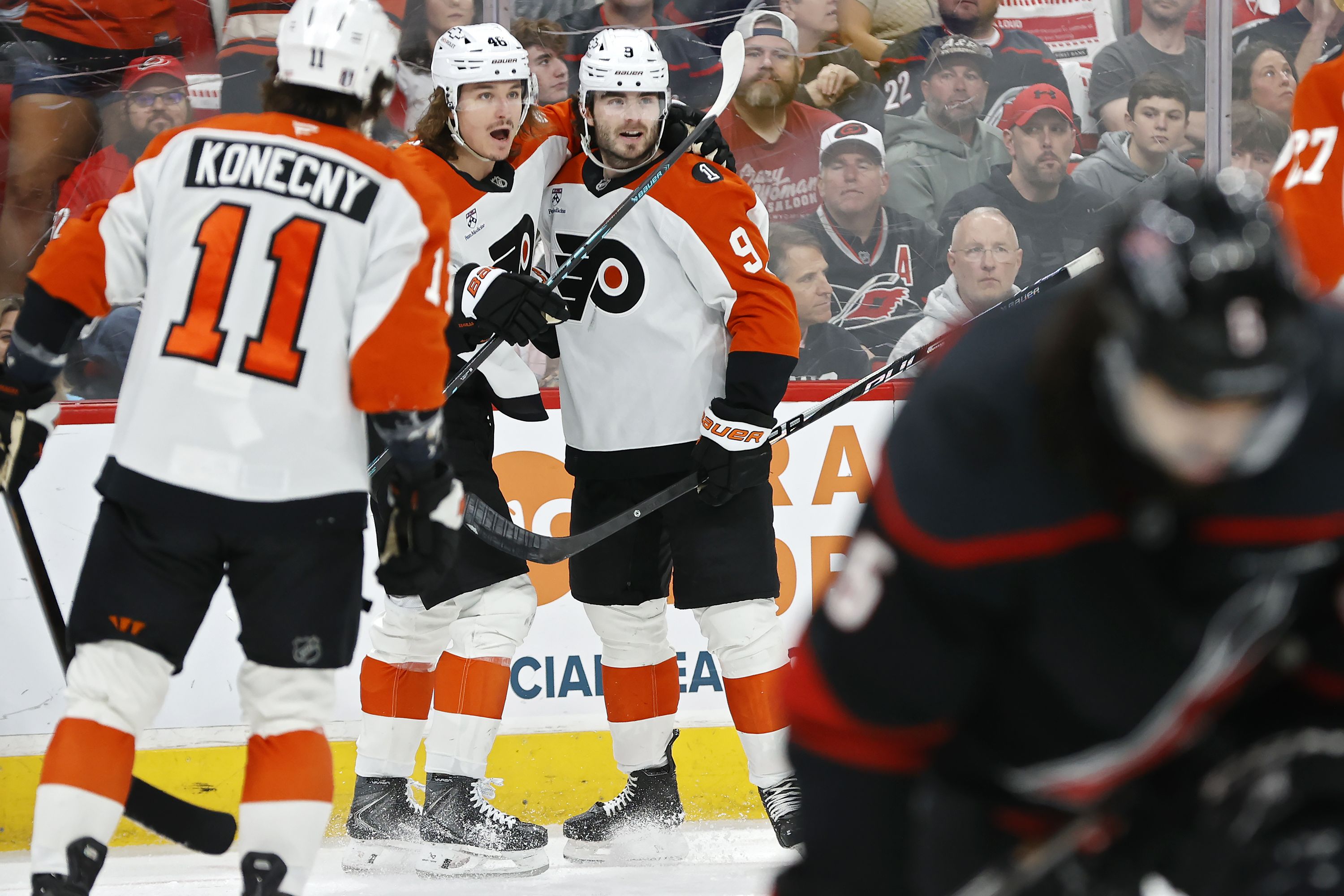 The Flyers' Jamie Drysdale celebrates a goal with Trevor Zegras during the first period against the Carolina Hurricanes in Game 2 the teams' playoff series.