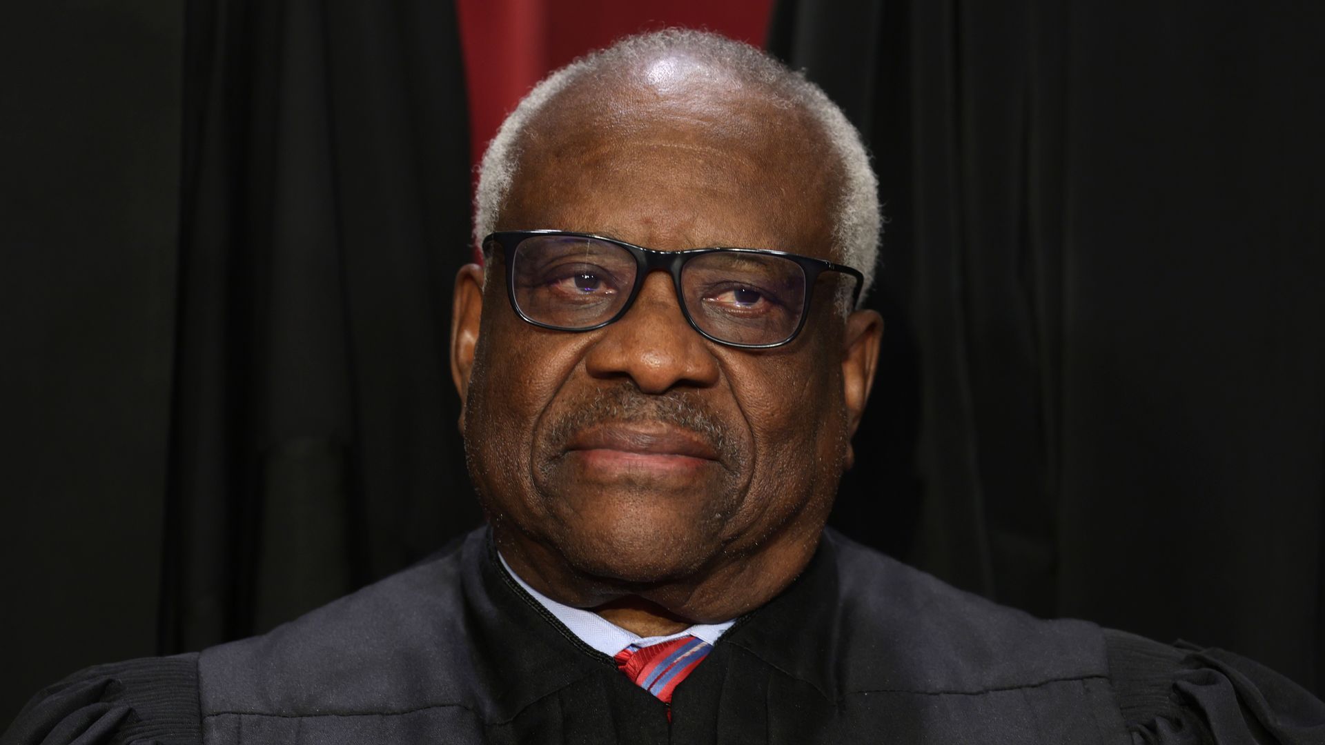 Supreme Court Justice Clarence Thomas, wearing black robes.