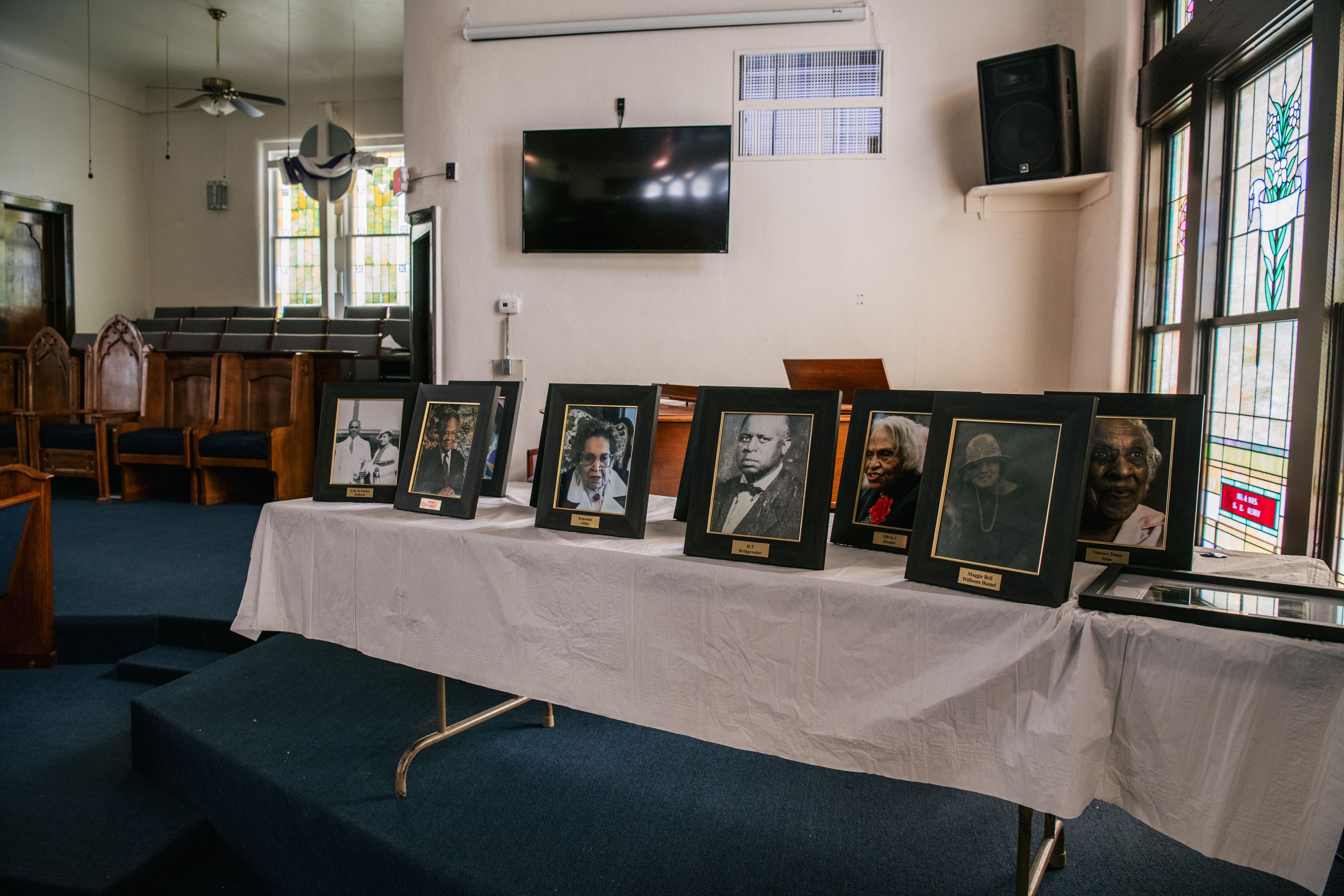Pictures of parishioners from the AME Church congregation are displayed during commemorations of the 100th anniversary of the Tulsa Race Massacre on May 30, 2021 in Tulsa, Oklahoma. 