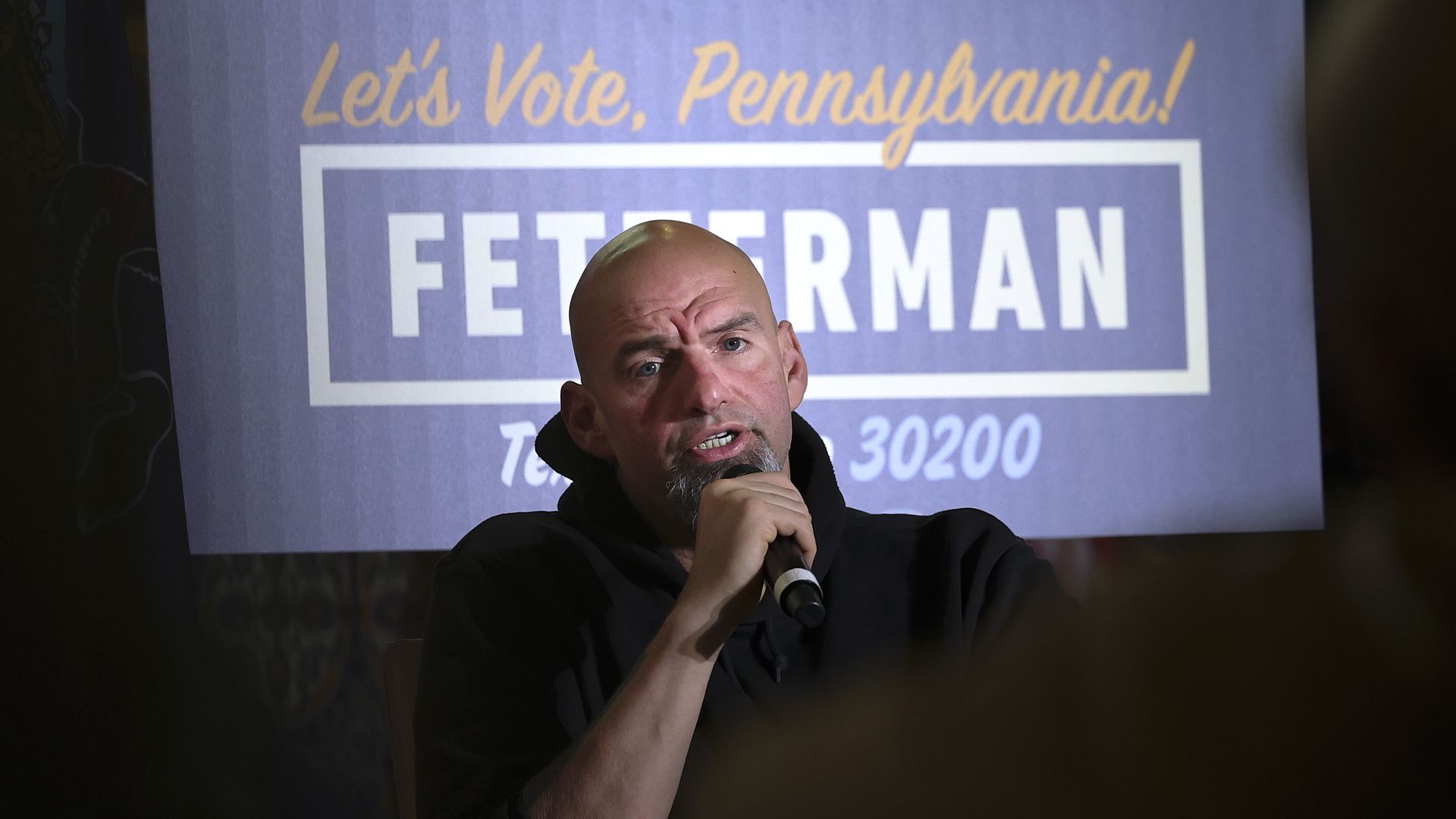 John Fetterman speaks during a campaign event 