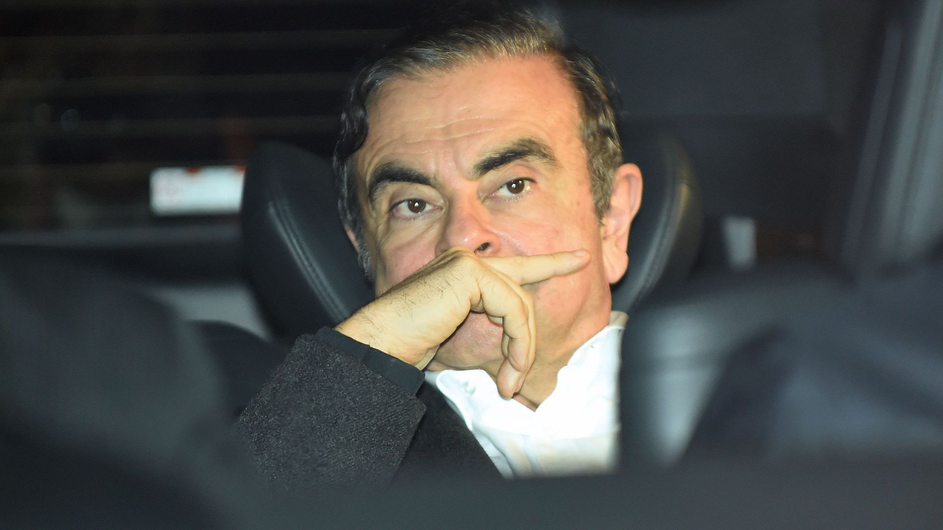 Carlos Goshn pictured in a car.