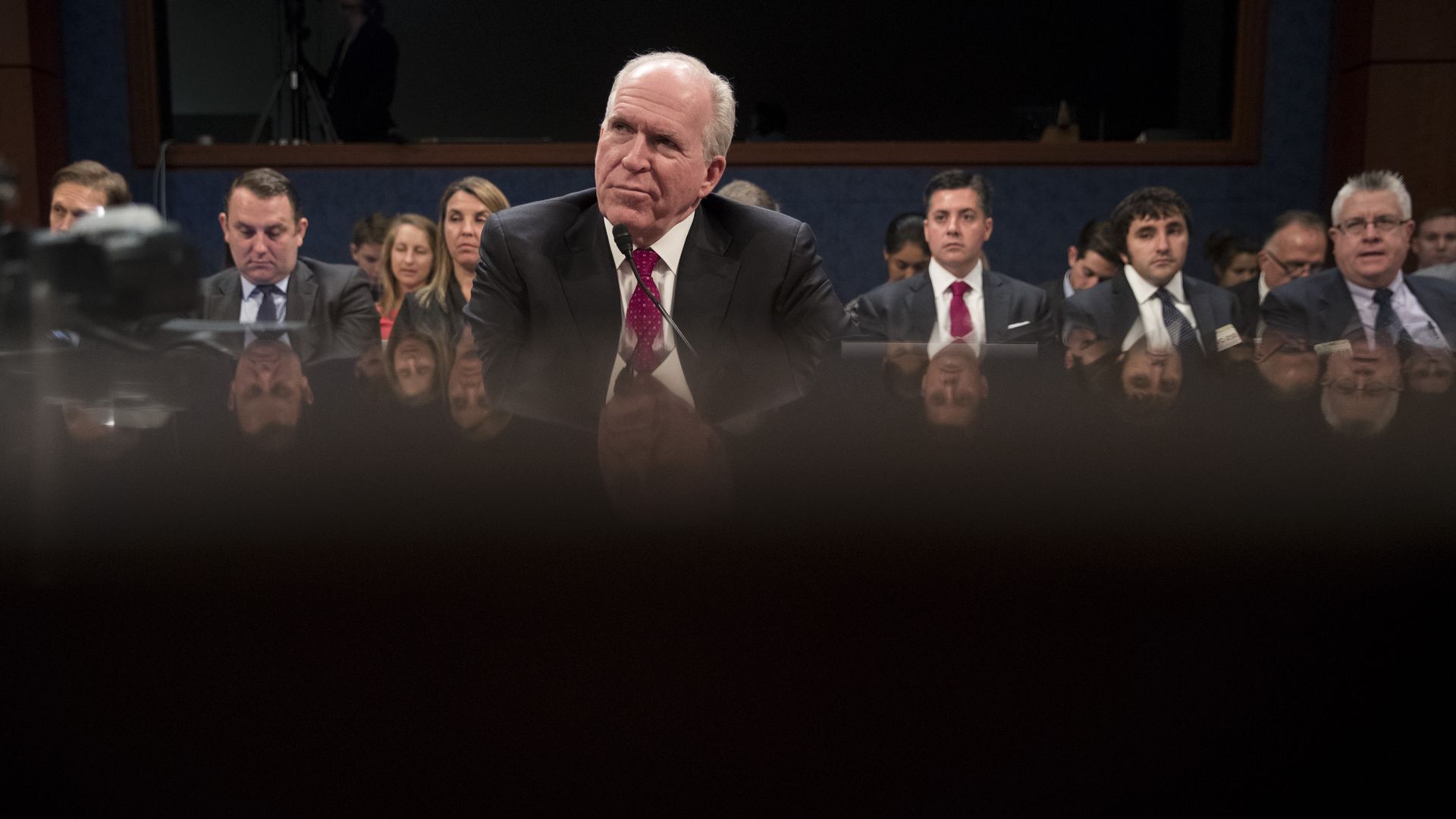 Former CIA Director John Brennan testifying before the House Intelligence Committee. 