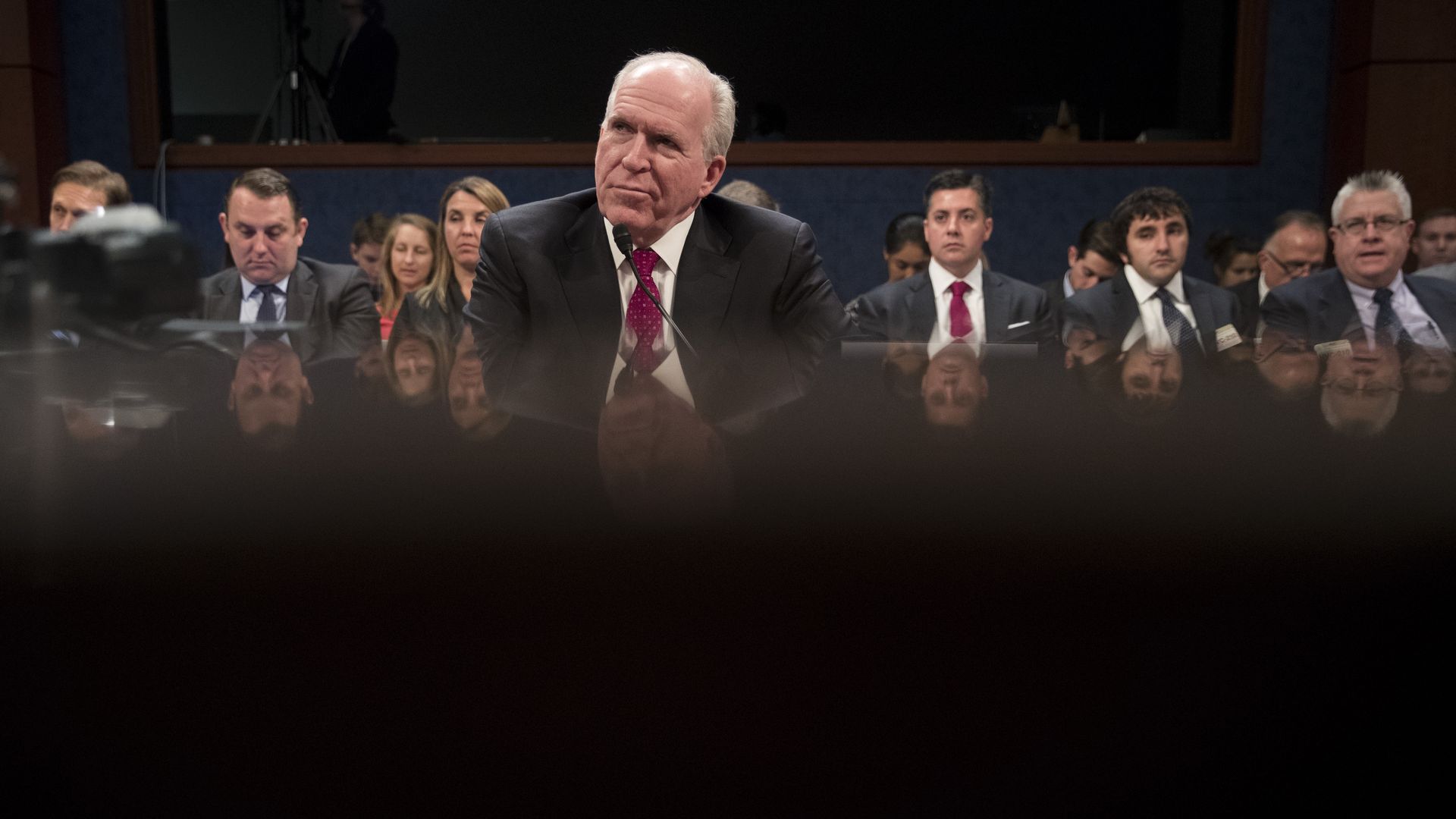Former CIA Director John Brennan testifying before the House Intelligence Committee.