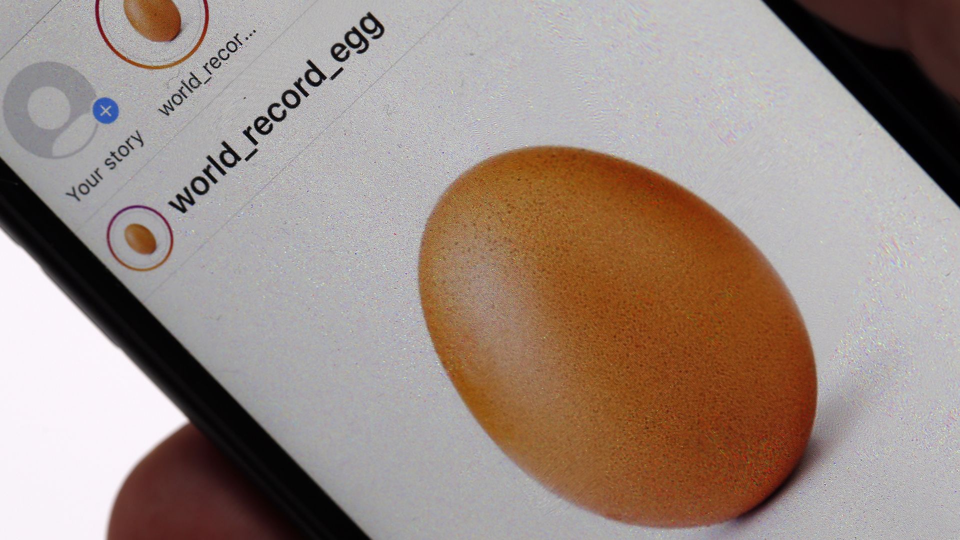 In this illustration photo, a mobile phone shows the image of an egg which was posted on the Instagram social network on January 14, 2019 in Paris, France