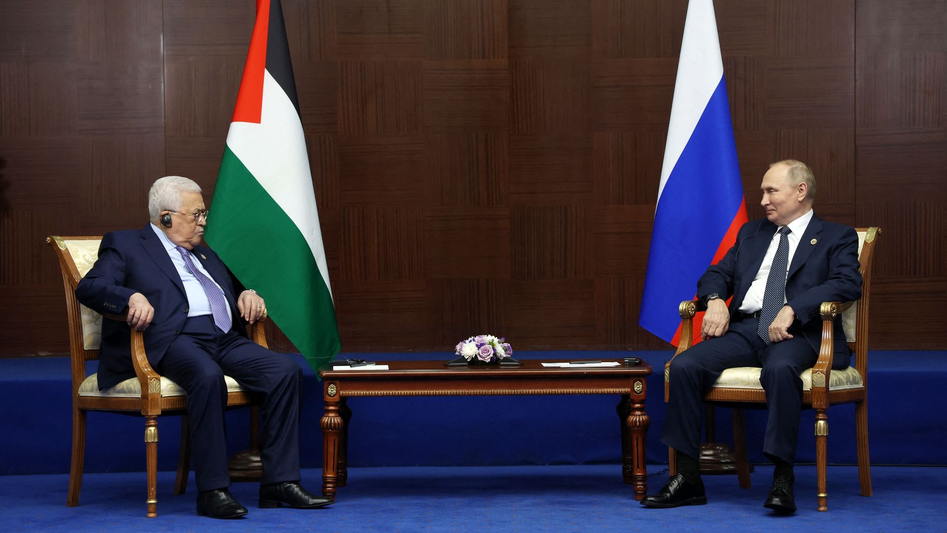 Russian President Vladimir Putin meets with Palestinian president Mahmud Abbas in Astana on October 13, 2022. 