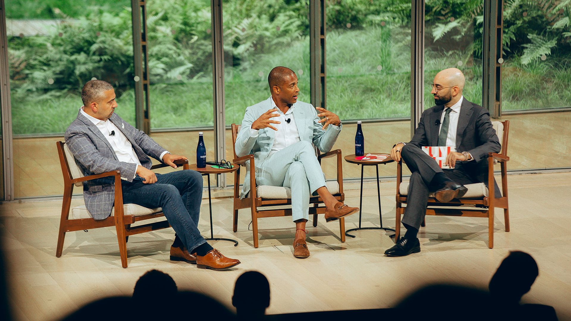 Zeteo founder Mehdi Hasan, Don Lemon and Status founder Oliver Darcy onstage at the Status Summit in New York on Sept. 9.