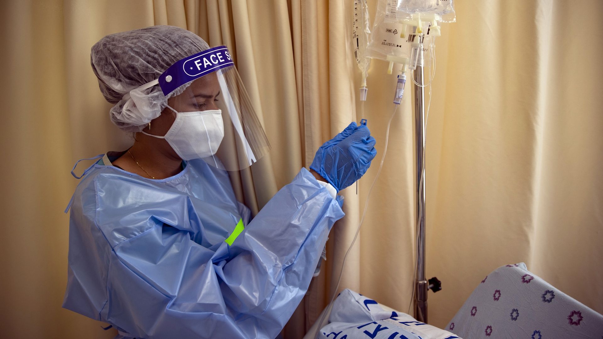 A health care worker preparing a coronavirus vaccine in a hospital in Jerusalem on Sept. 3.