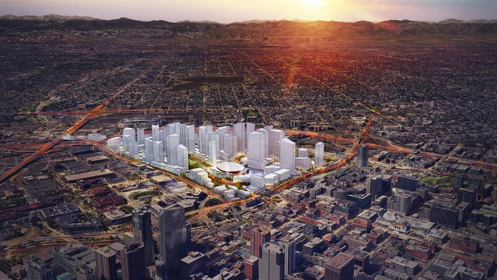 Aerial view of a dense city at sunset, with a cluster of white, futuristic skyscrapers surrounding a circular arena; orange highways loop through the urban core, mountains in the distance.