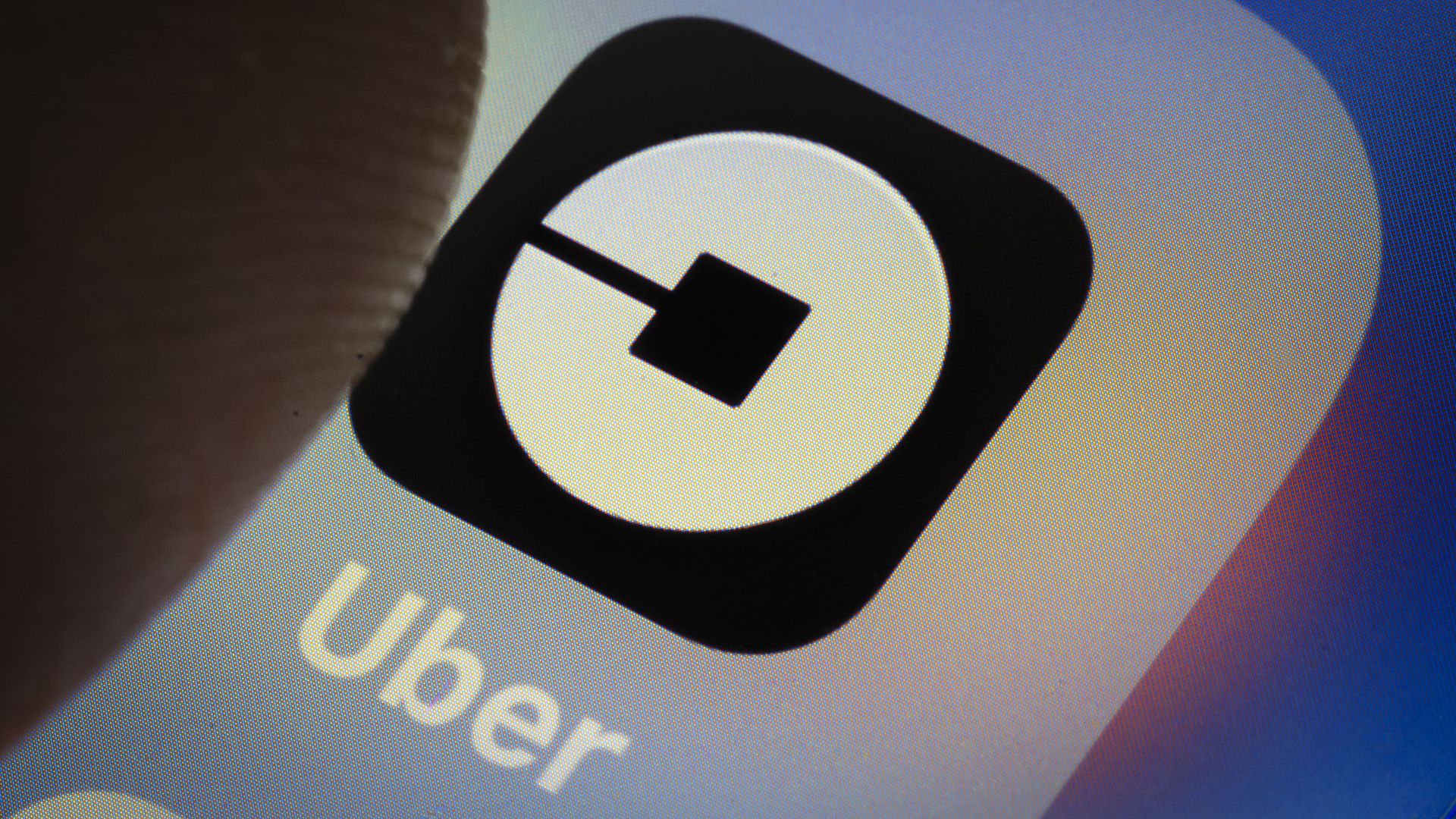 Photo of Uber mobile app icon close-up.