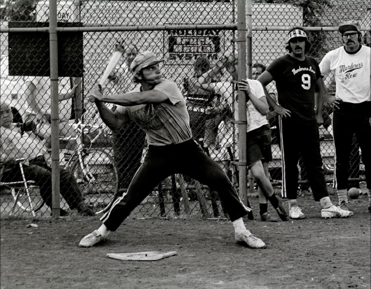 Photo of a softball game in action 